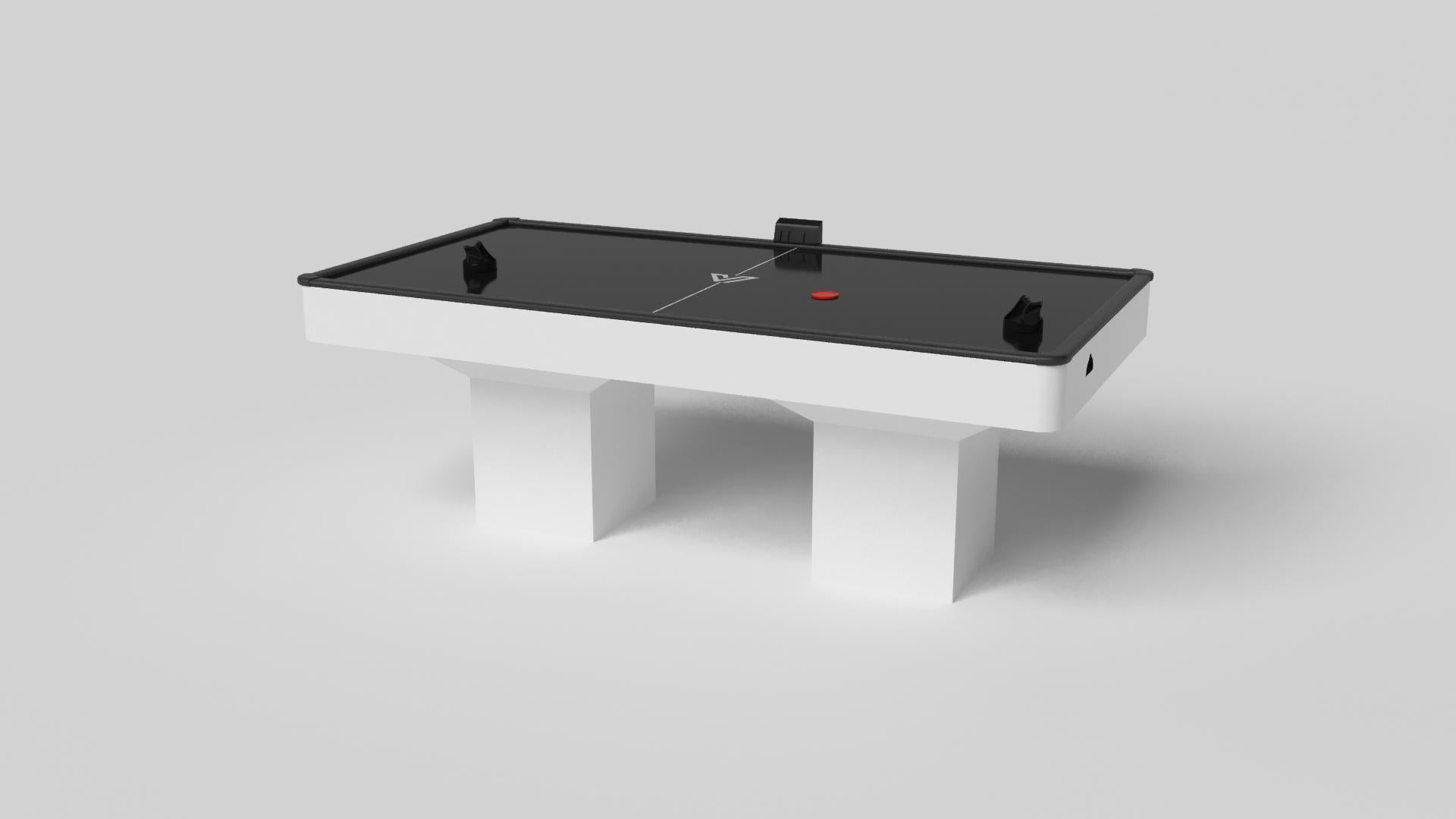 Minimalist design meets opulent elegance in the Trestle air hockey table. Detailed with a professional surface for endless game play, this contemporary table is expertly crafted. Square block legs give it a stark, geometric look that contributes to