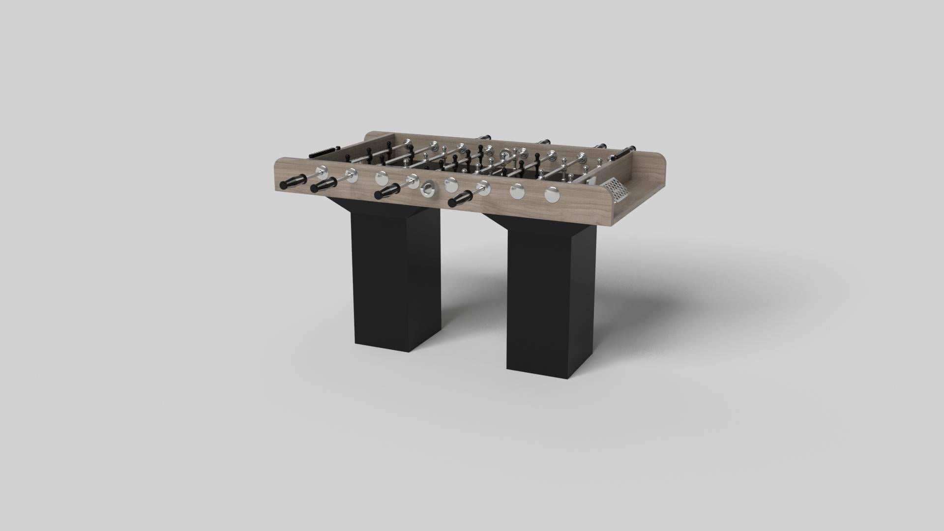 Minimalist design meets opulent elegance in the Trestle foosball table. Detailed with a professional surface for endless game play, this contemporary table is expertly crafted. Square block legs give it a stark, geometric look that contributes to