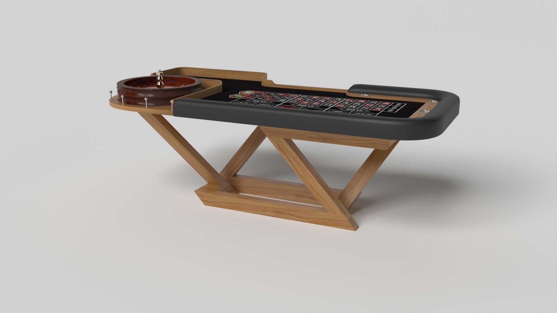 Una composizione contemporanea di linee pulite e bordi eleganti, il tavolo da roulette Trinity in nero e rosso è un'elegante espressione di design moderno. Realizzato a mano in un design rettangolare con la classica ruota della roulette e le caselle