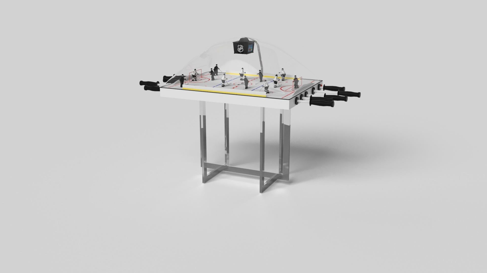 Avec une base ouverte en métal, notre table Beso est une expression unique de formes contemporaines et d'espace négatif. Cette table de hockey à dôme est fabriquée à la main par nos maîtres artisans avec une base rectangle dans rectangle qui reprend