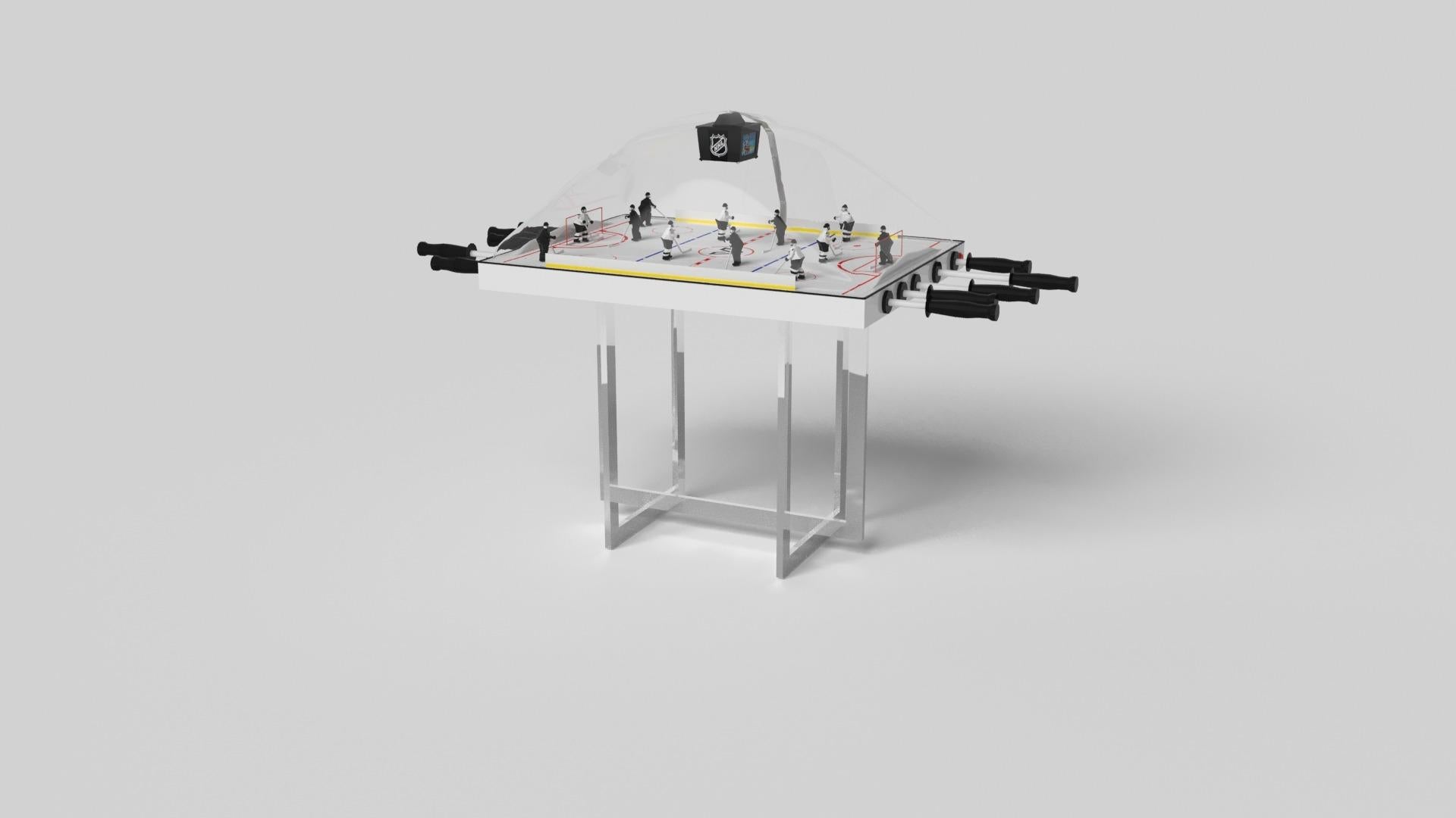 Avec une base ouverte en métal, notre table Beso est une expression unique de formes contemporaines et d'espace négatif. Cette table de hockey à dôme est fabriquée à la main par nos maîtres artisans avec une base rectangle dans rectangle qui reprend