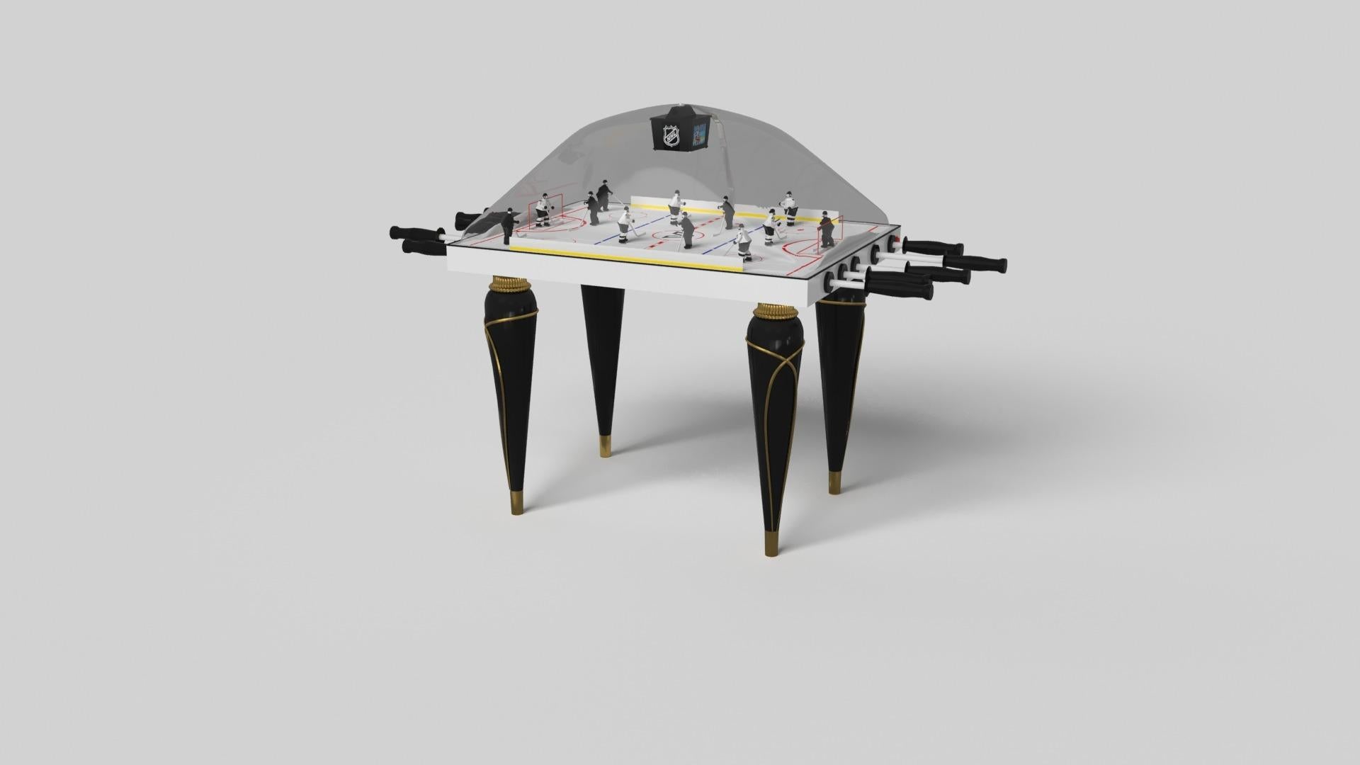 Champagne gold accents add undeniable elegance to this luxury dome hockey table. Offering superior playability and uncompromised style, this design features hand carved details, decorative metal elements, and metal sabots at the bottom of each leg.