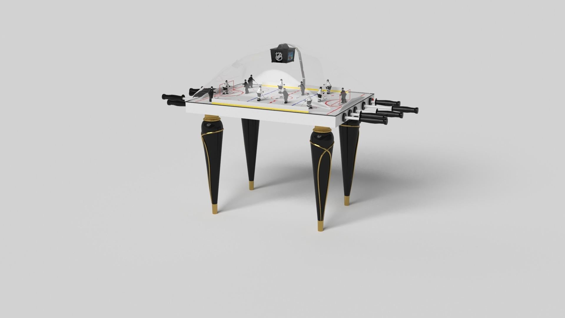 Champagne gold accents add undeniable elegance to this luxury dome hockey table. Offering superior playability and uncompromised style, this design features hand carved details, decorative metal elements, and metal sabots at the bottom of each leg.