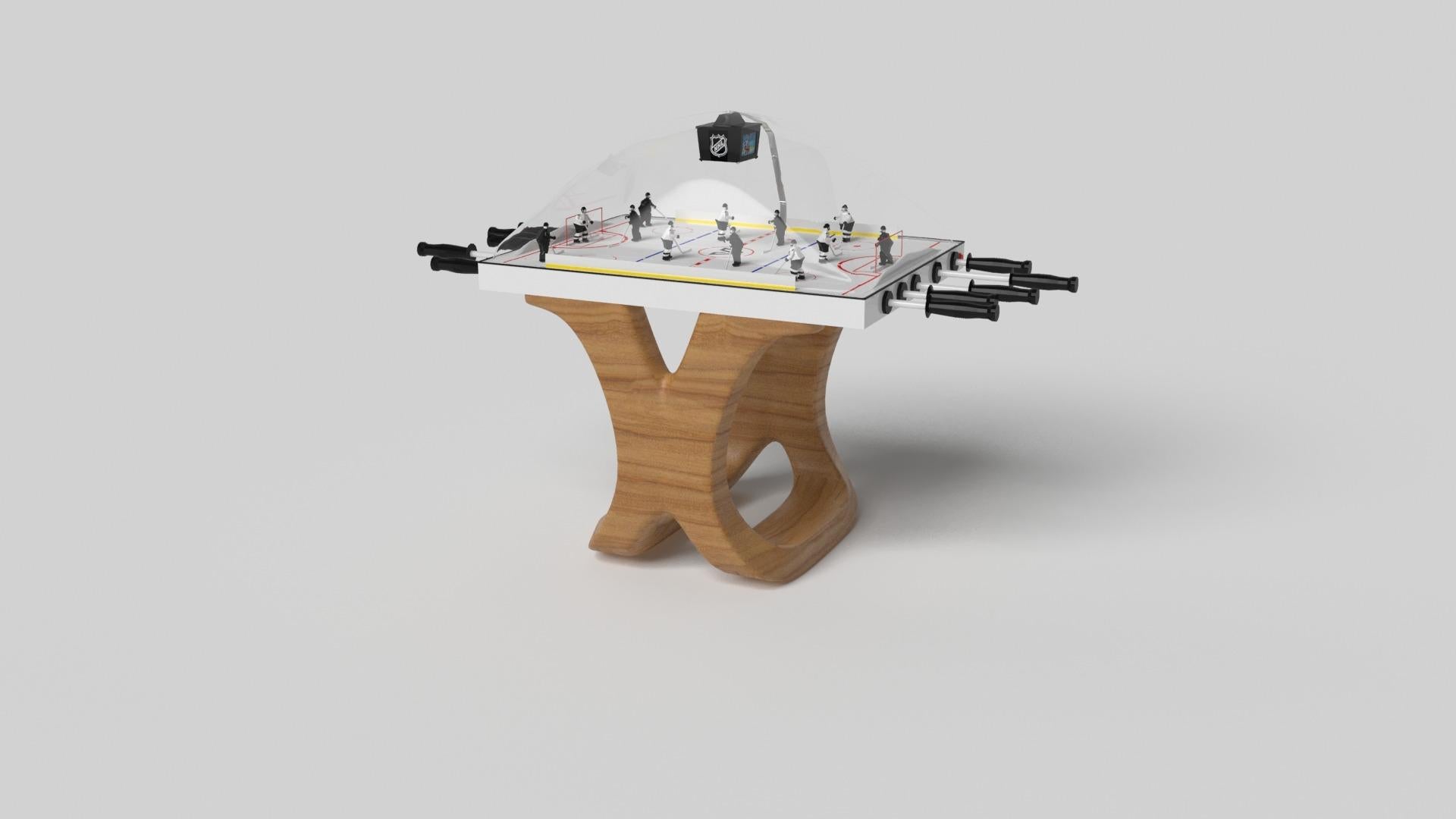 Ispirato all'opera di Antoni Gaudi e al movimento del Modernismo catalano, il tavolo da hockey a cupola Draco in noce vanta uno stile audace con gambe lisce e curve. Realizzato con maestria in legno di noce, questo tavolo è caratterizzato da un'alta