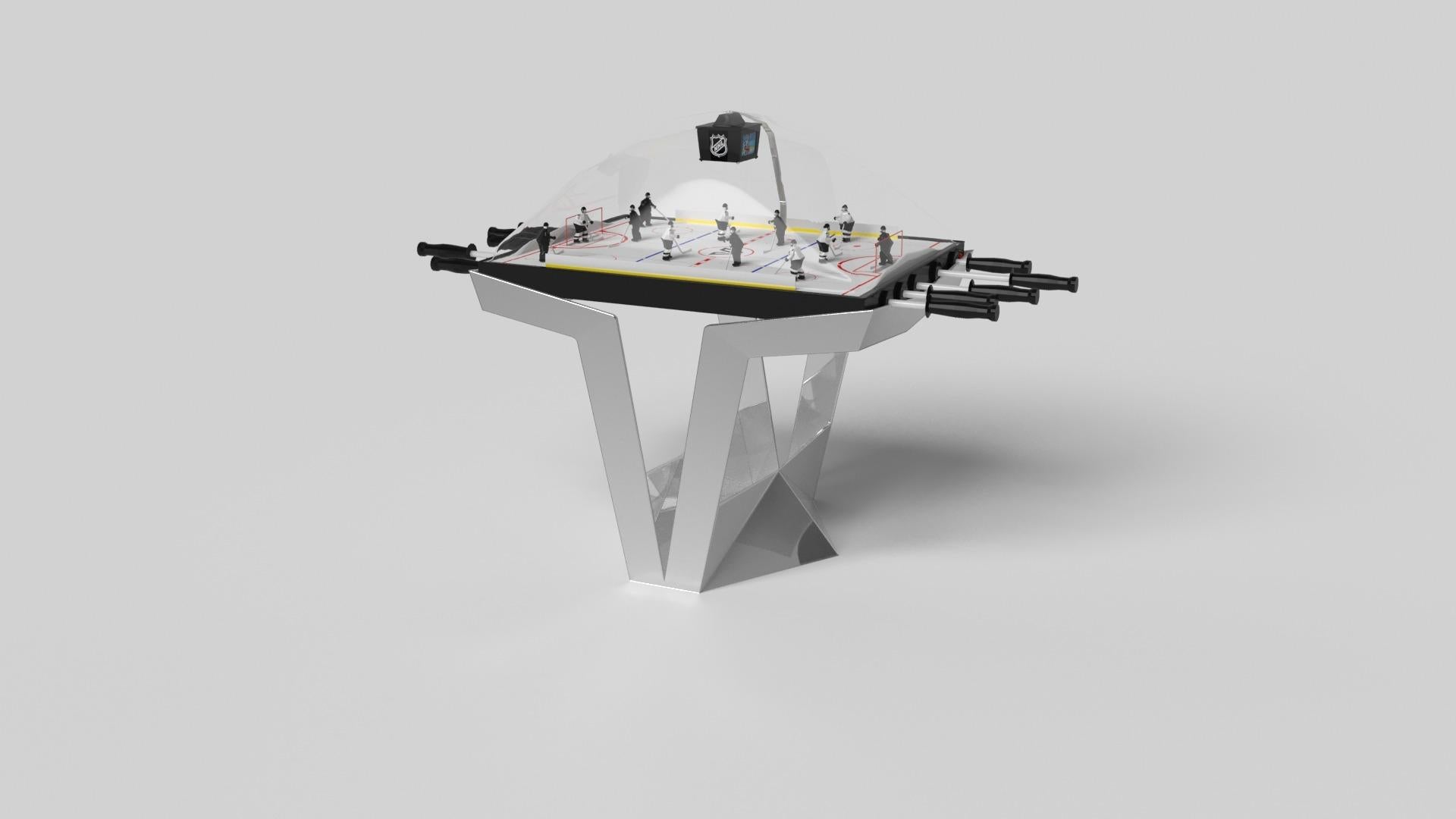 La table de hockey dôme Enzo s'inspire des angles aérodynamiques des véhicules européens haut de gamme. Conçue avec des lignes épurées en forme de V et une utilisation réfléchie de l'espace négatif, cette table affiche un esprit énergique tout en
