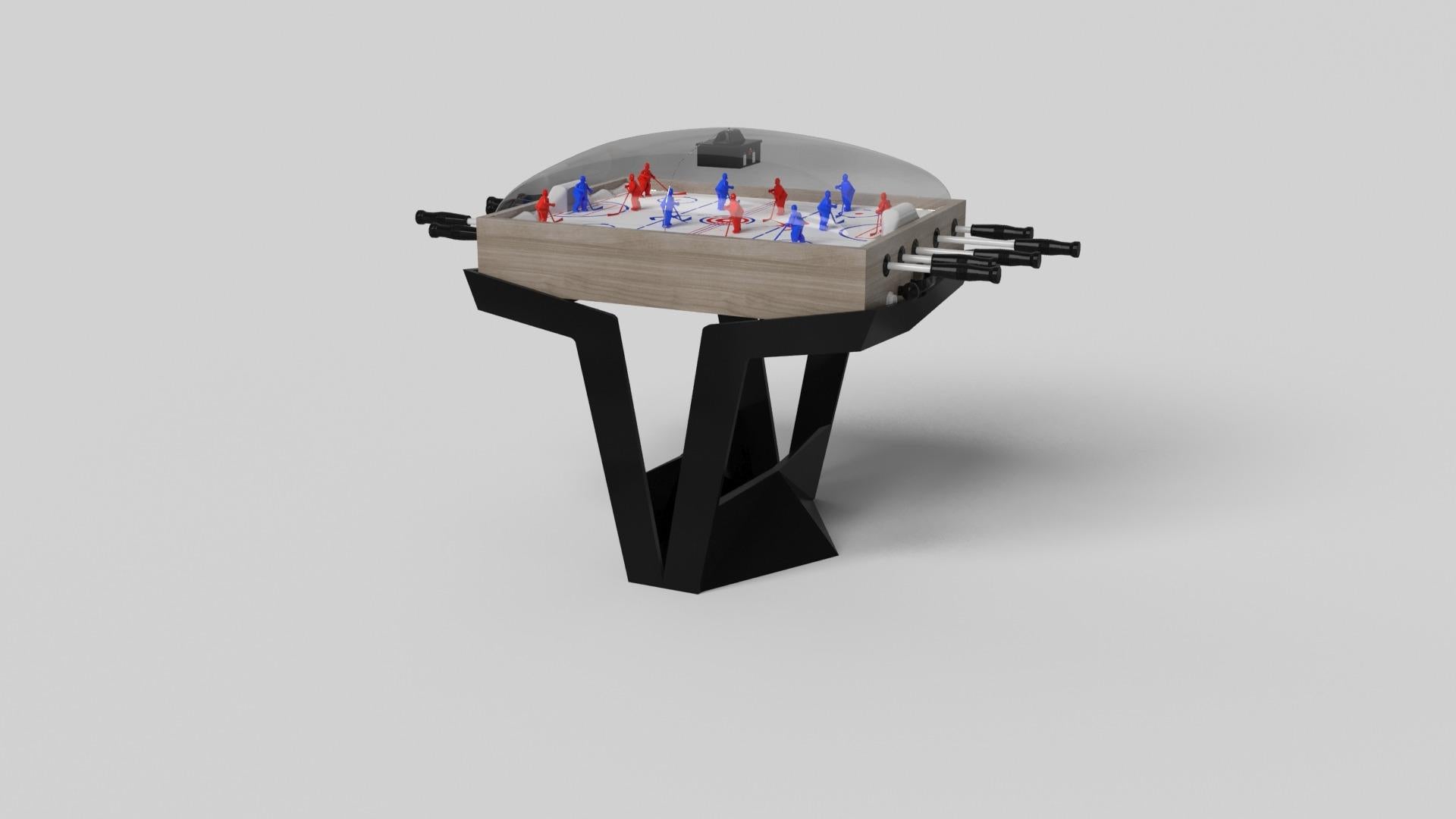 La mesa de hockey de cúpula Enzo está inspirada en los ángulos aerodinámicos de los vehículos europeos de alta gama. Diseñada con líneas elegantes en forma de V y un uso reflexivo del espacio negativo, esta mesa presume de un espíritu enérgico, a la