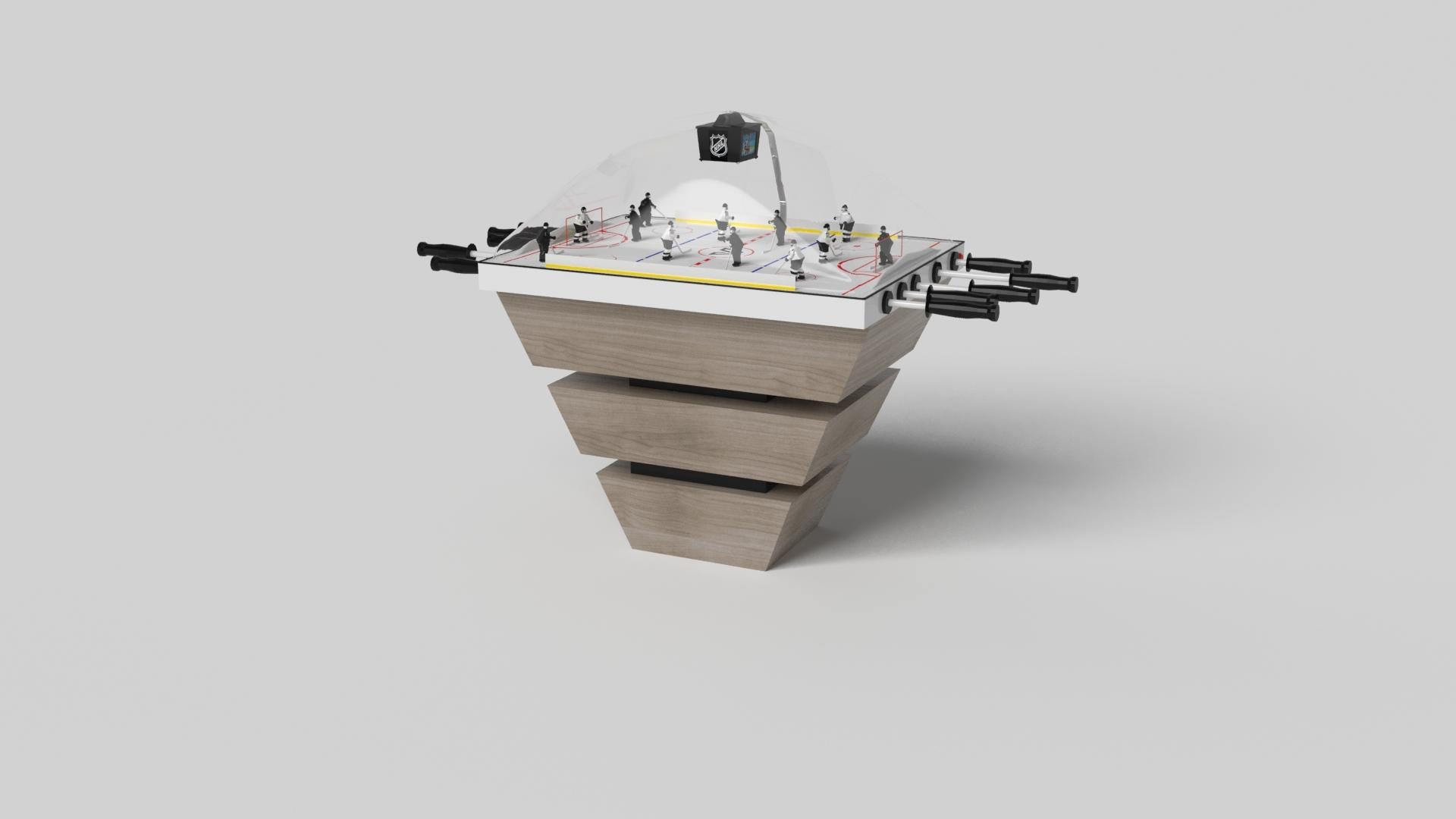 Tre solidi pezzi di legno sembrano fluttuare intorno a una base centrale nascosta, rendendo il tavolo da hockey a cupola Louve cromato uno dei nostri design più sorprendenti. Questo tavolo da gioco contemporaneo presenta una finitura liscia e