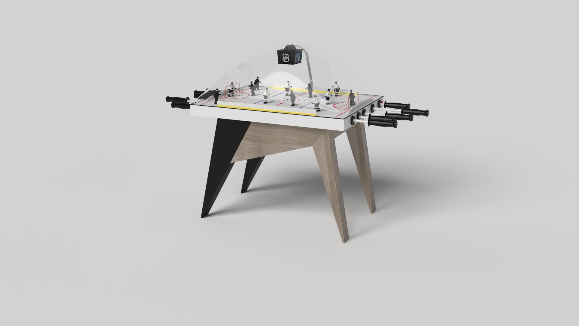 Sencilla pero sofisticada, la mesa de hockey Mantis con cúpula da un giro fresco y moderno a un diseño clásico de cuatro patas. Los ángulos agudos y las patas cónicas proporcionan una estabilidad elegante, mientras que los acentos de color en