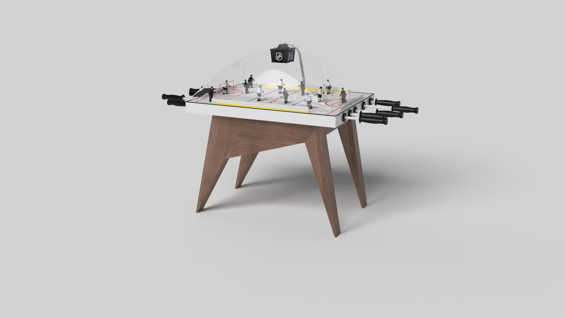 Simple yet sophisticated, the Mantis dome hockey table puts a fresh, modern spin on a classic four-legged design. Sharp angles and tapered legs provide sleek stability, while contrast color accents add an air of exuberance and an energetic