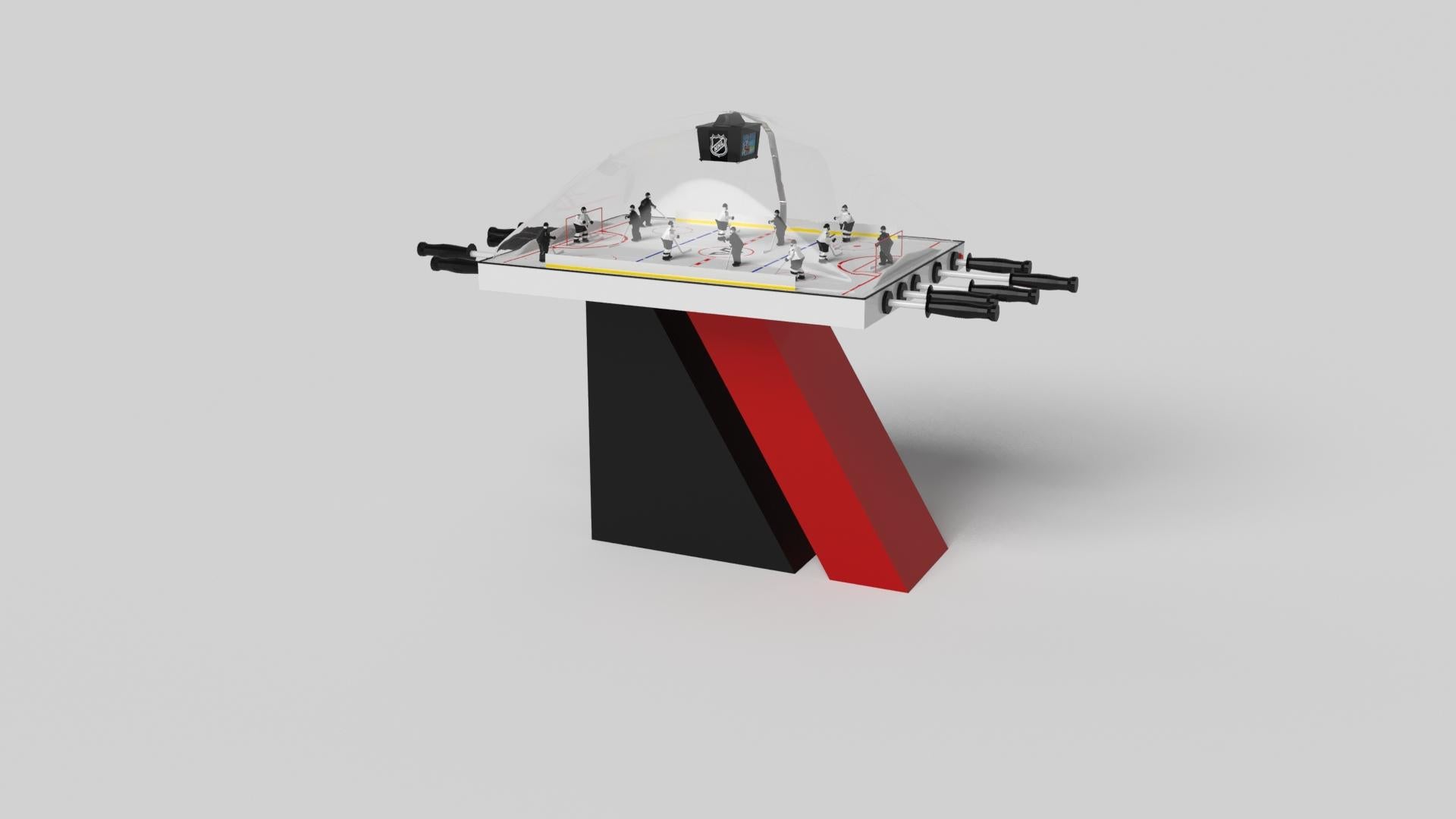 An asymmetric base creates a free-floating silhouette, making the Stilt dome hockey table in chrome with walnut a compelling, contemporary addition to the modern home. Crafted from durable metal with walnut wood accents, this luxury handcrafted game