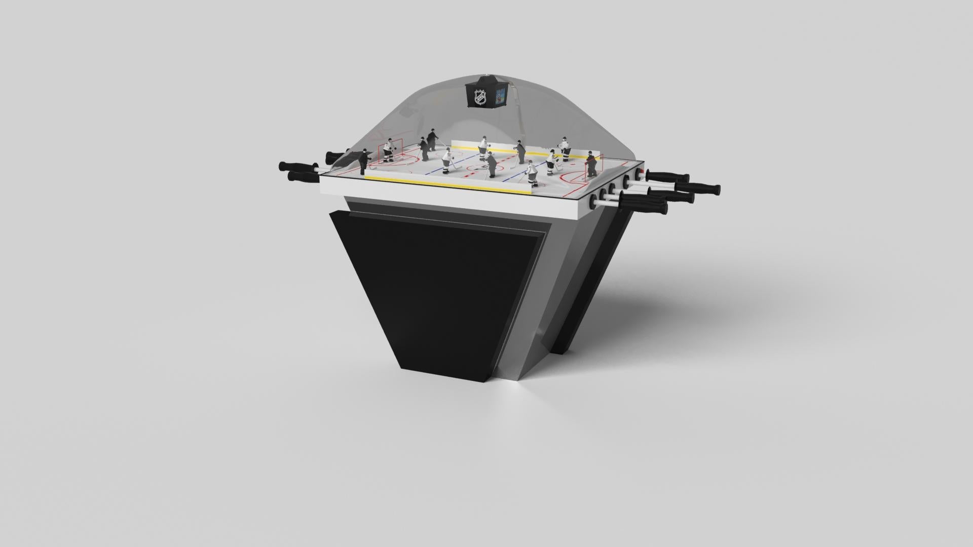 Hecha a mano con líneas limpias, ángulos agudos y una base piramidal, la mesa de hockey de cúpula Vogue en cromo con negro consigue el equilibrio perfecto entre el estilo de inspiración deportiva y el diseño contemporáneo. Intemporal en su atractivo