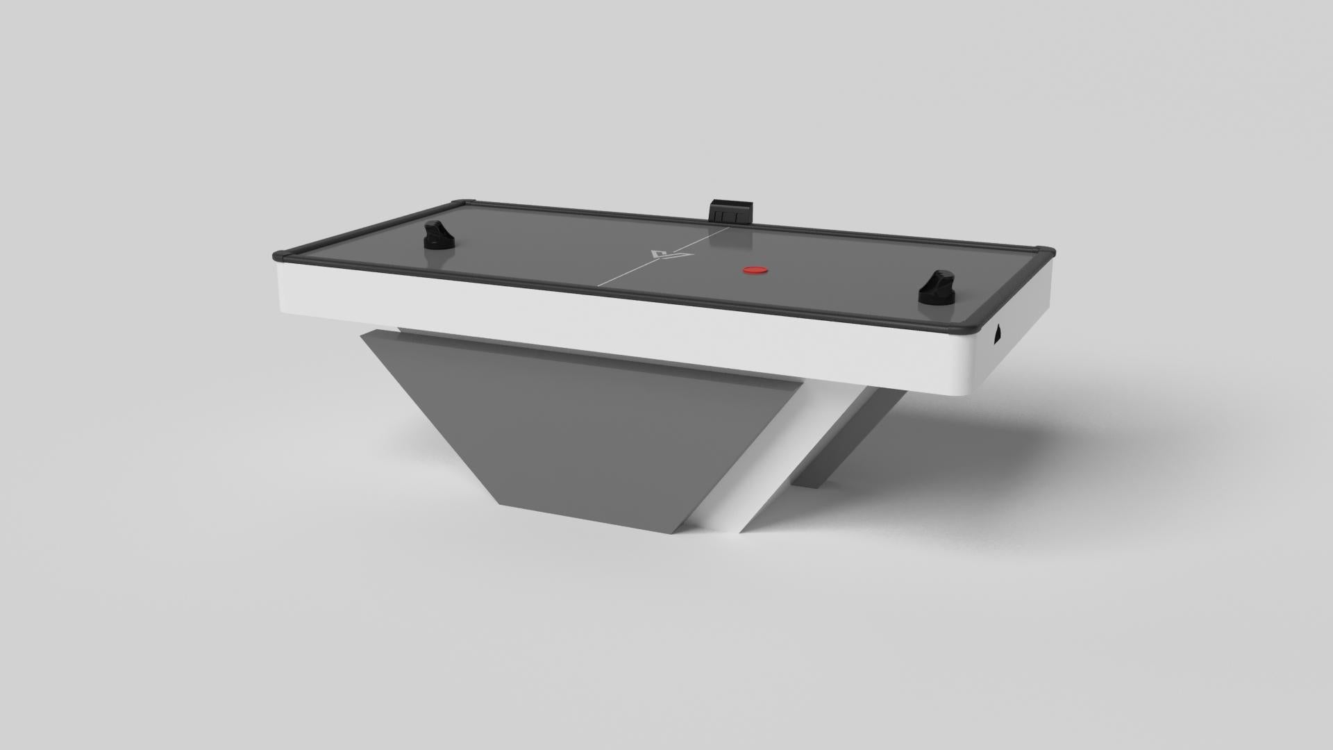 Handcrafted with clean lines, sharp angles, and a pyramid base, the Vogue air hockey table in chrome with black strikes the perfect balance between sport-inspired style and contemporary design. Timeless in its appeal and revered for its practicality