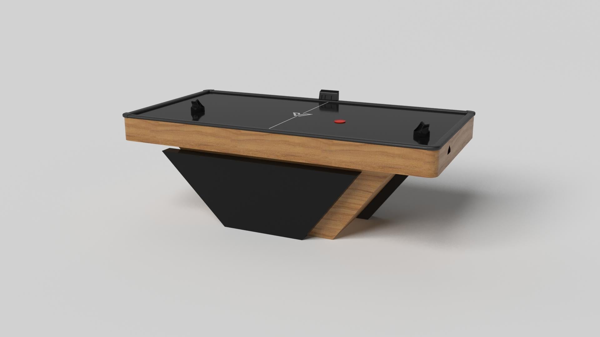 Handcrafted with clean lines, sharp angles, and a pyramid base, the Vogue air hockey table in chrome with black strikes the perfect balance between sport-inspired style and contemporary design. Timeless in its appeal and revered for its practicality