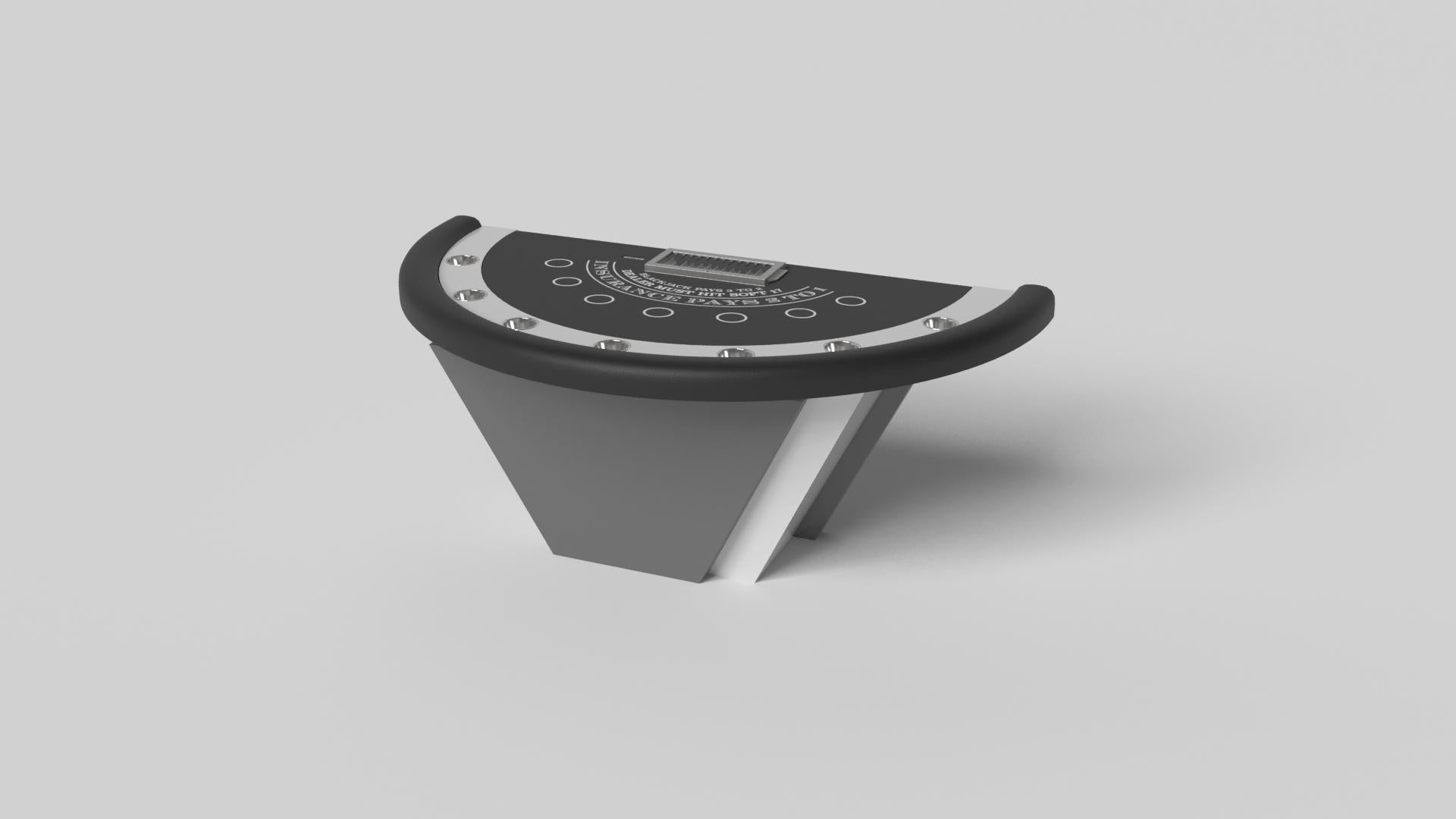 Hecha a mano con líneas limpias, ángulos agudos y una base piramidal, la mesa de blackjack Vogue de aluminio cepillado consigue el equilibrio perfecto entre el estilo de inspiración deportiva y el diseño contemporáneo. Intemporal en su atractivo y