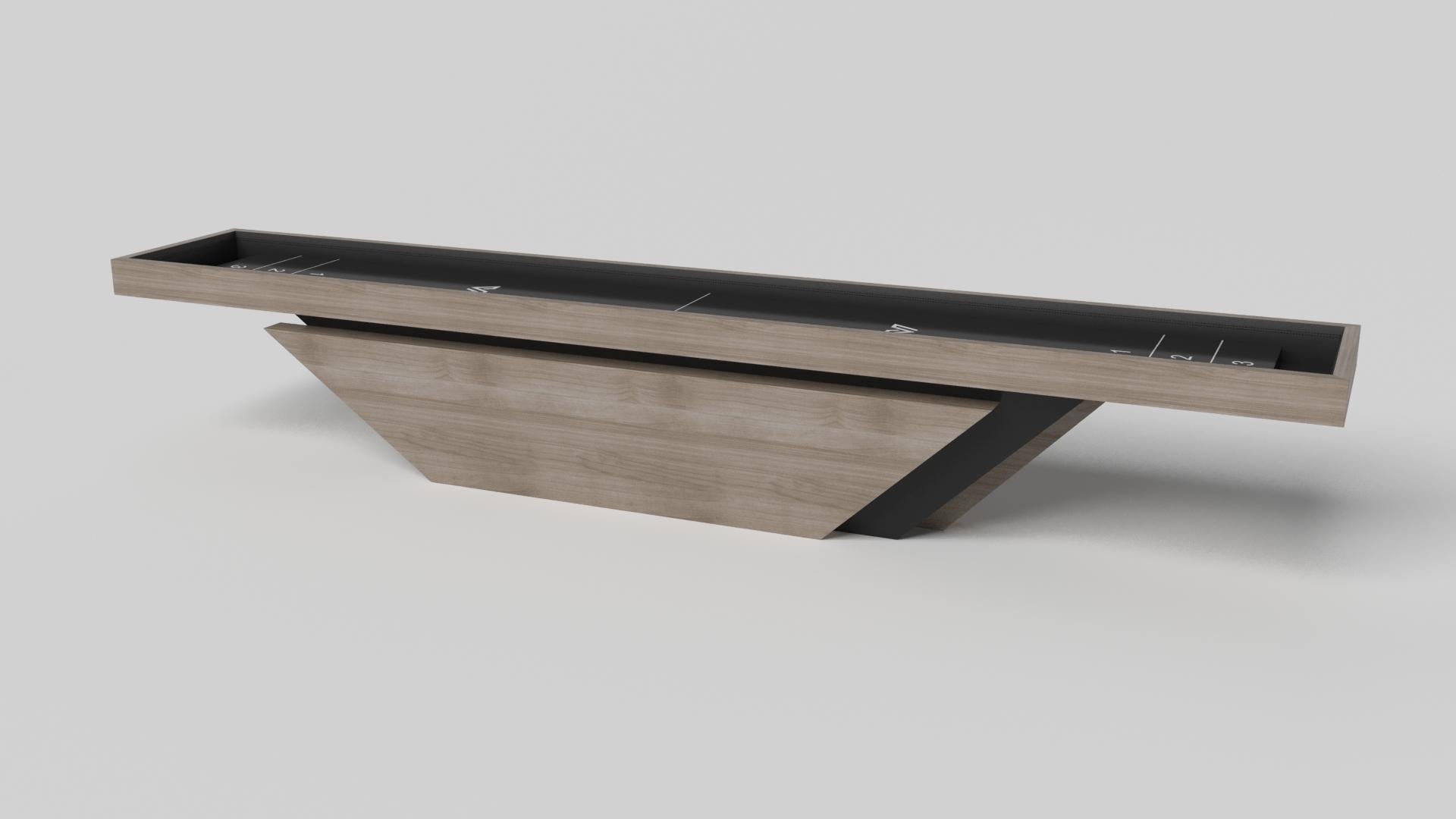 Handcrafted with clean lines, sharp angles, and a pyramid base, the Vogue shuffleboard table in chrome with black strikes the perfect balance between sport-inspired style and contemporary design. Timeless in its appeal and revered for its