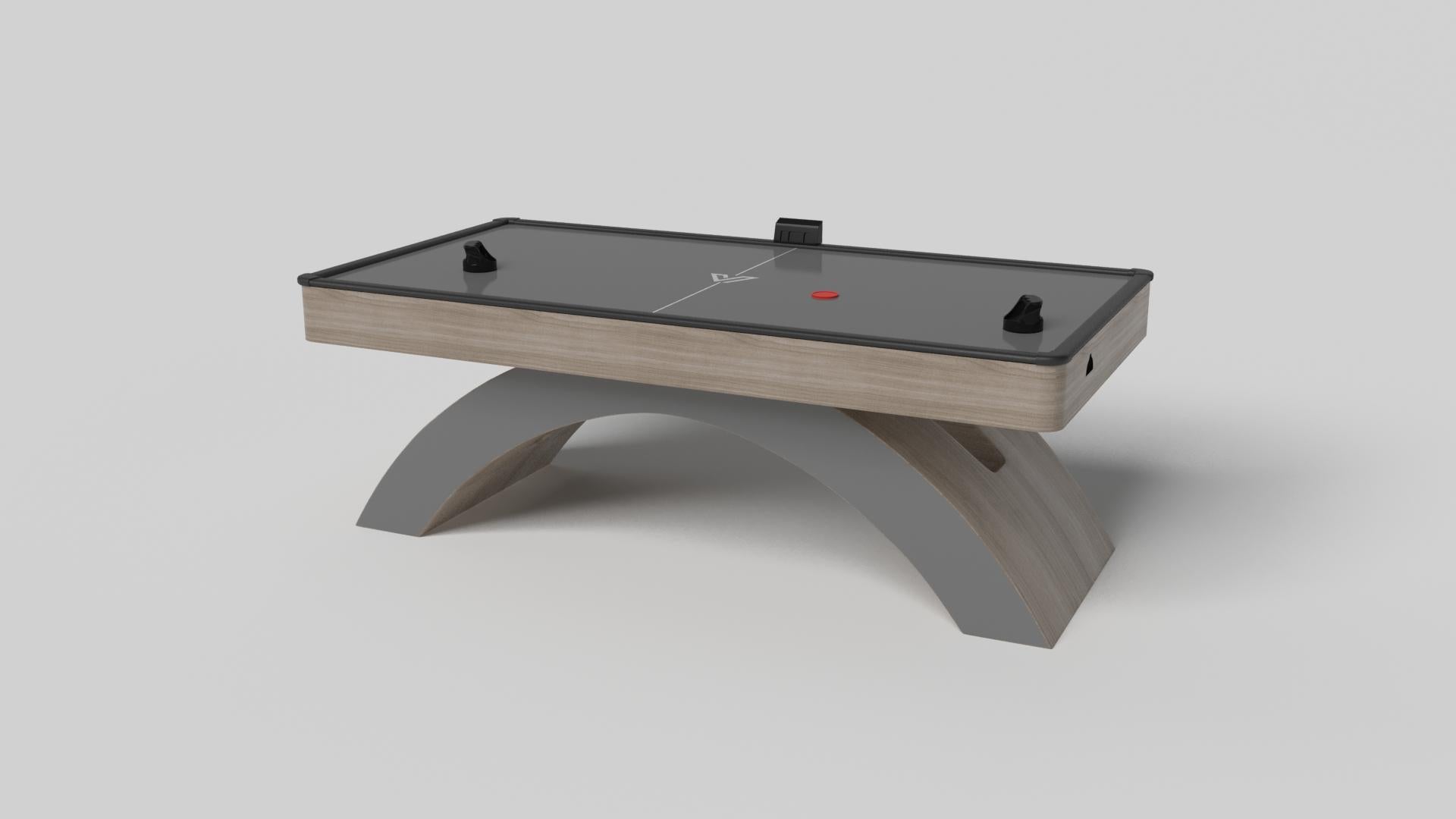 Une base ouverte et arquée s'équilibre magnifiquement avec les bords durs du plateau rectangulaire, faisant de la table de hockey sur gazon Zenith en noir et rouge une juxtaposition frappante de formes modernes et géométriques. Minimaliste mais