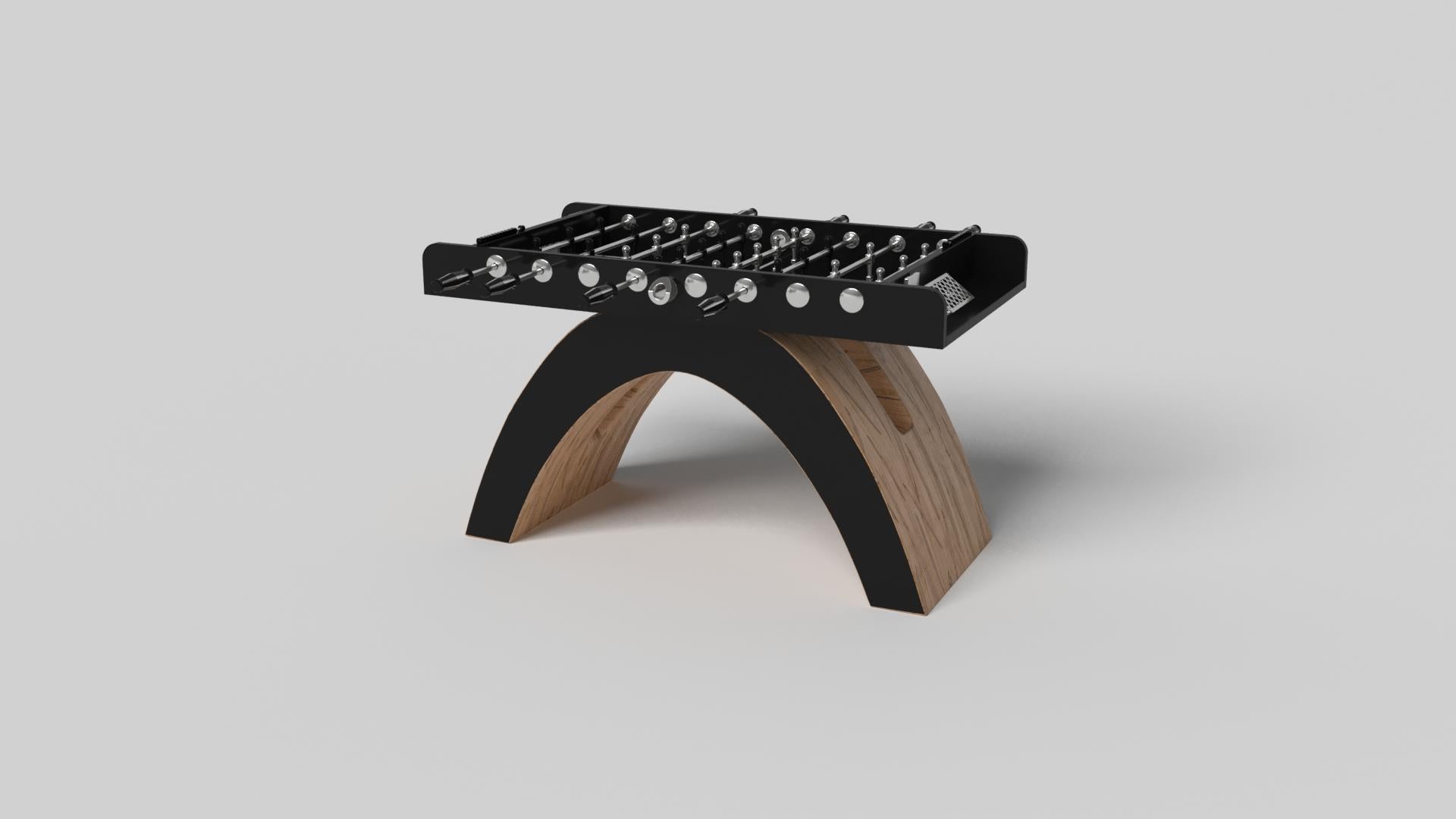 An open, arched base balances beautifully against the hard edges of the rectangular surface top, making the Zenith foosball table in black with red a striking juxtaposition of modern, geometric forms. Minimalist in its appeal yet luxurious in