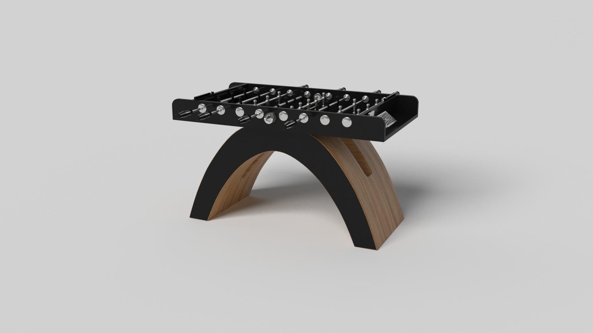 An open, arched base balances beautifully against the hard edges of the rectangular surface top, making the Zenith foosball table in black with red a striking juxtaposition of modern, geometric forms. Minimalist in its appeal yet luxurious in