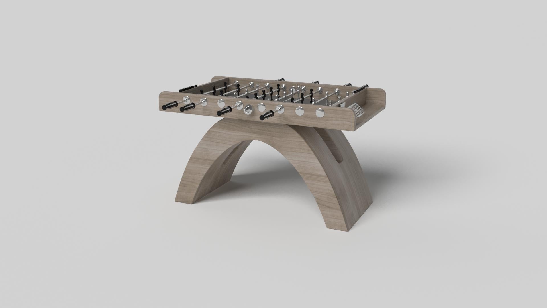 An open, arched base balances beautifully against the hard edges of the rectangular surface top, making the Zenith foosball table in black with red a striking juxtaposition of modern, geometric forms. Minimalist in its appeal yet luxurious in