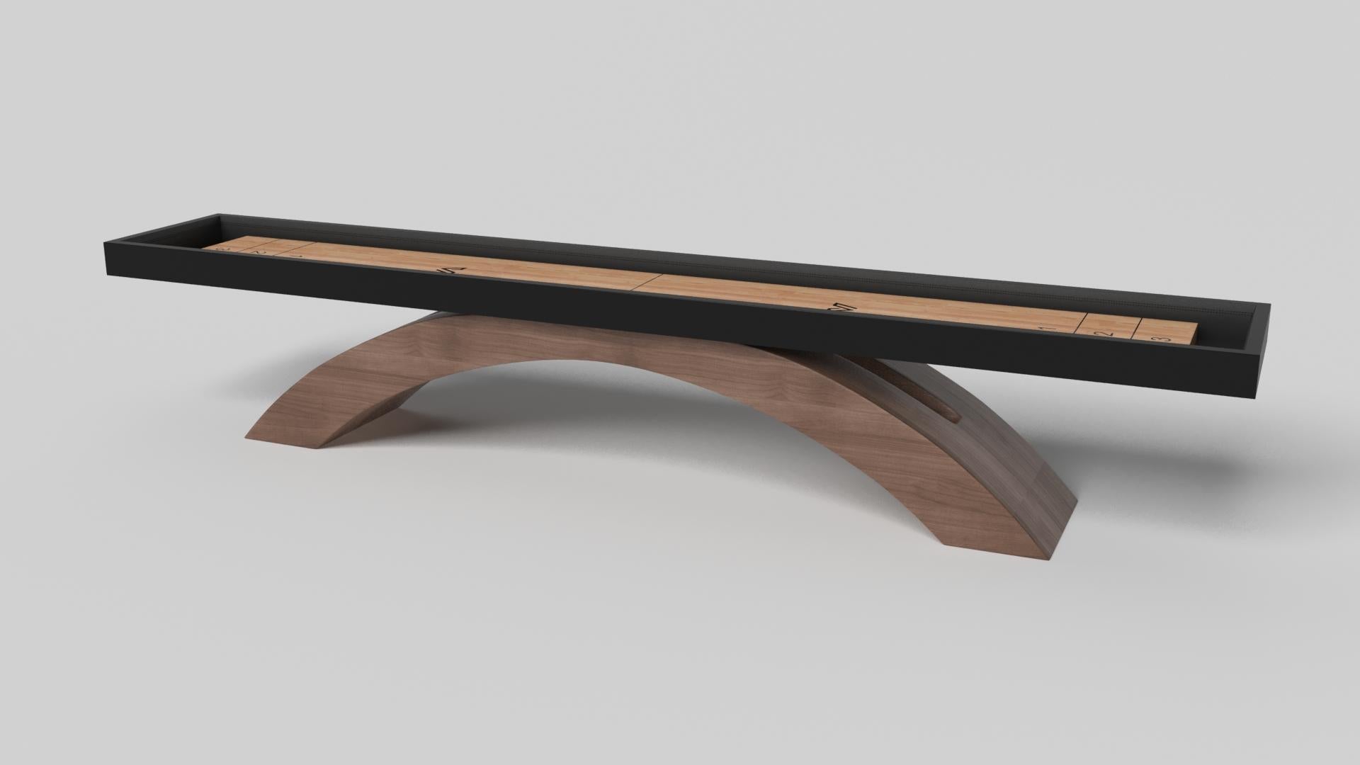 An open, arched base balances beautifully against the hard edges of the rectangular surface top, making the Zenith shuffleboard table in black with red a striking juxtaposition of modern, geometric forms. Minimalist in its appeal yet luxurious in