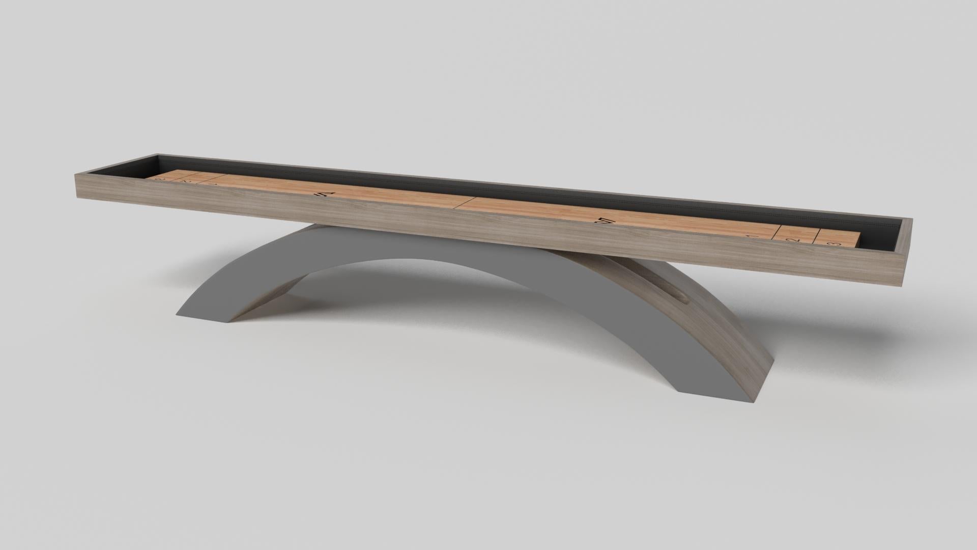 An open, arched base balances beautifully against the hard edges of the rectangular surface top, making the Zenith shuffleboard table in black with red a striking juxtaposition of modern, geometric forms. Minimalist in its appeal yet luxurious in