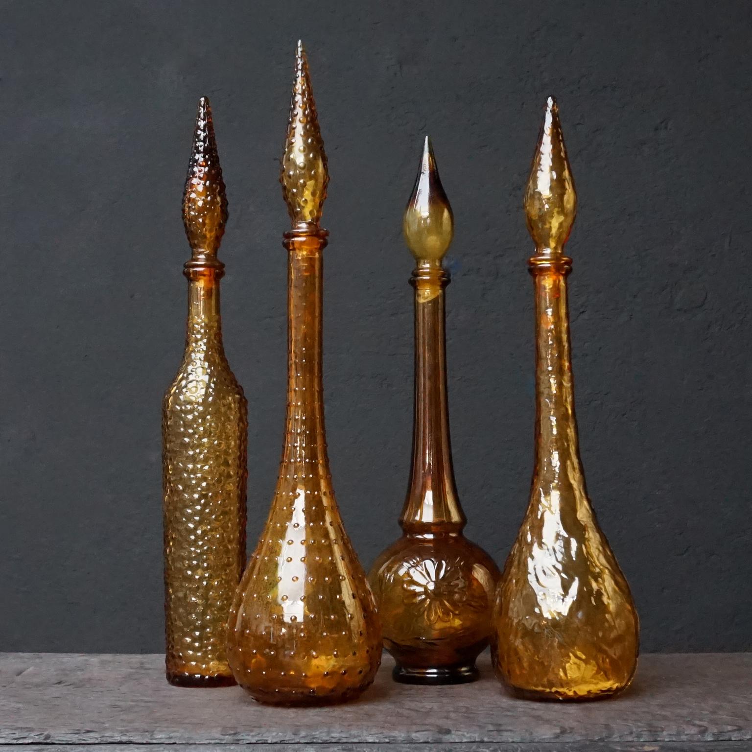 Mid-Century Modern Eleven 1960s Italian Empoli Rossini Amber Genie Glass Bottles Vase and Candy Jar