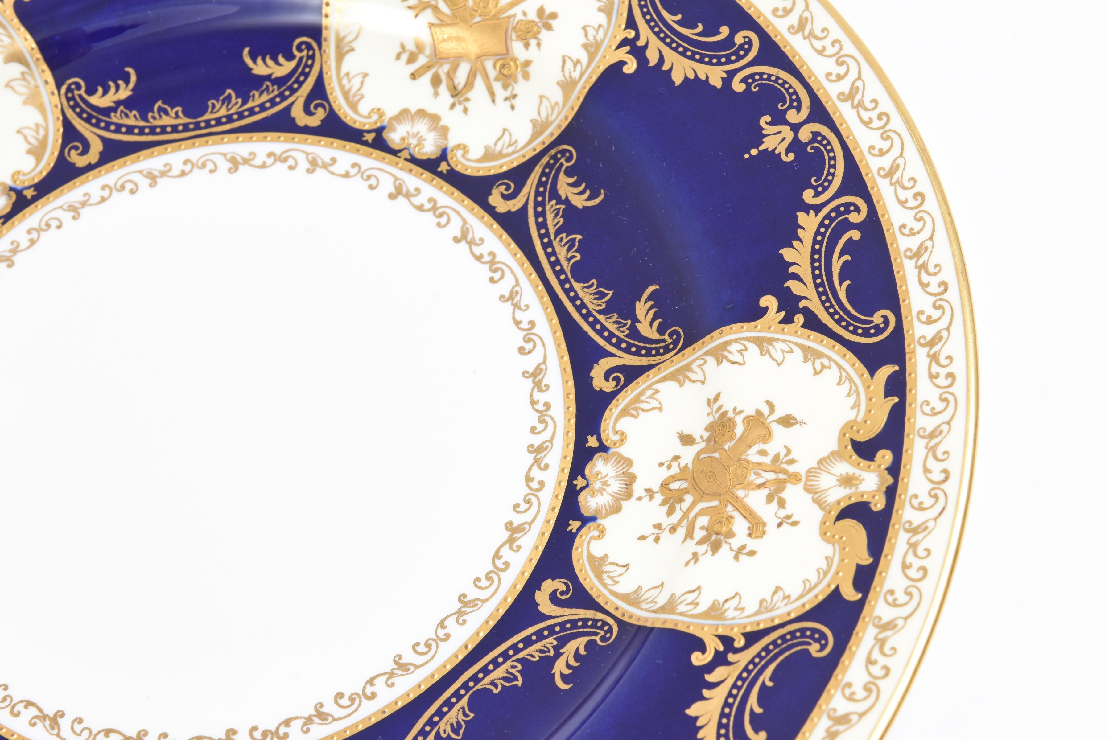 Neoclassical Eleven Antique English Dinner Plates, Cobalt Blue Gilded Musical Instruments For Sale