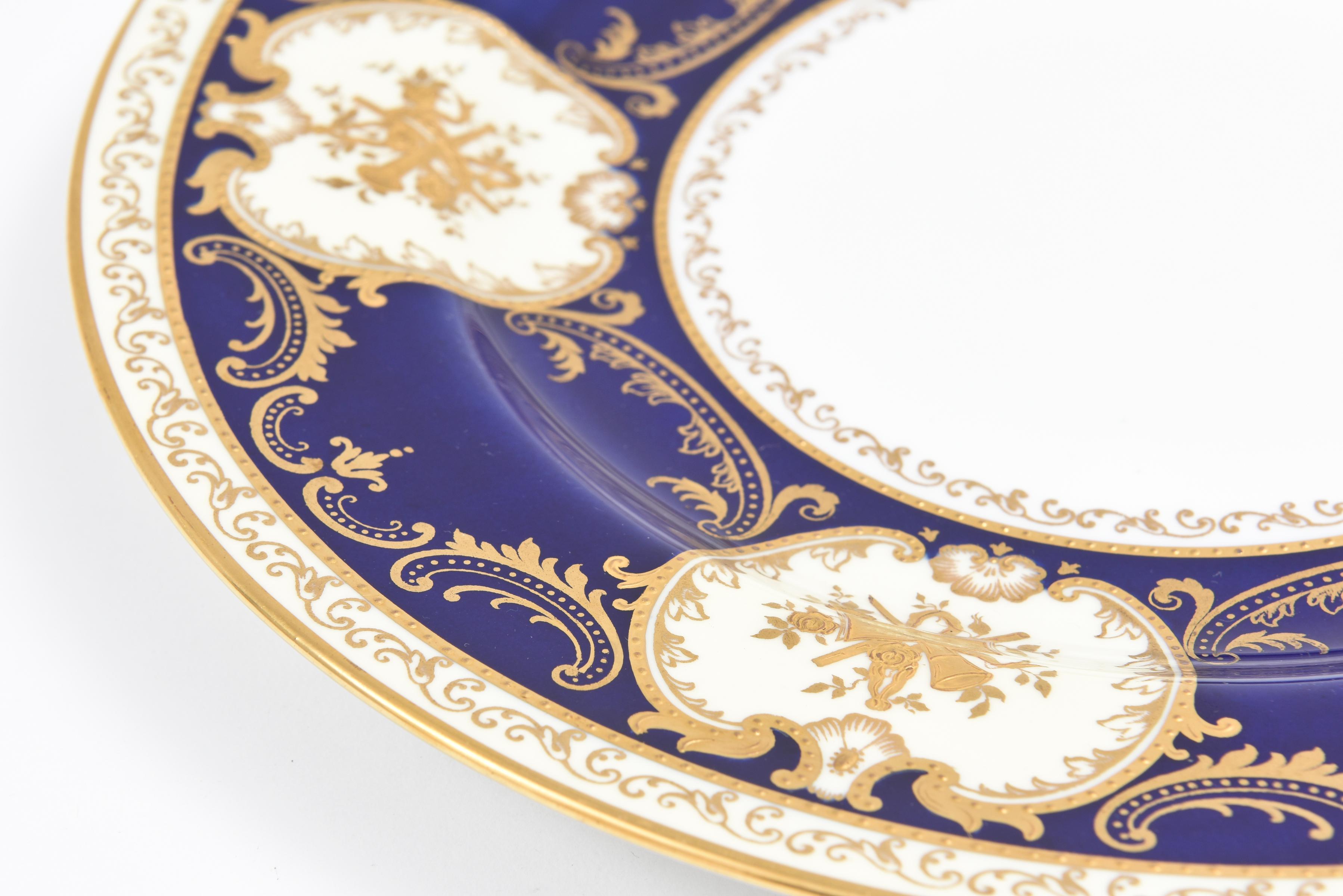 British Eleven Antique English Dinner Plates, Cobalt Blue Gilded Musical Instruments For Sale