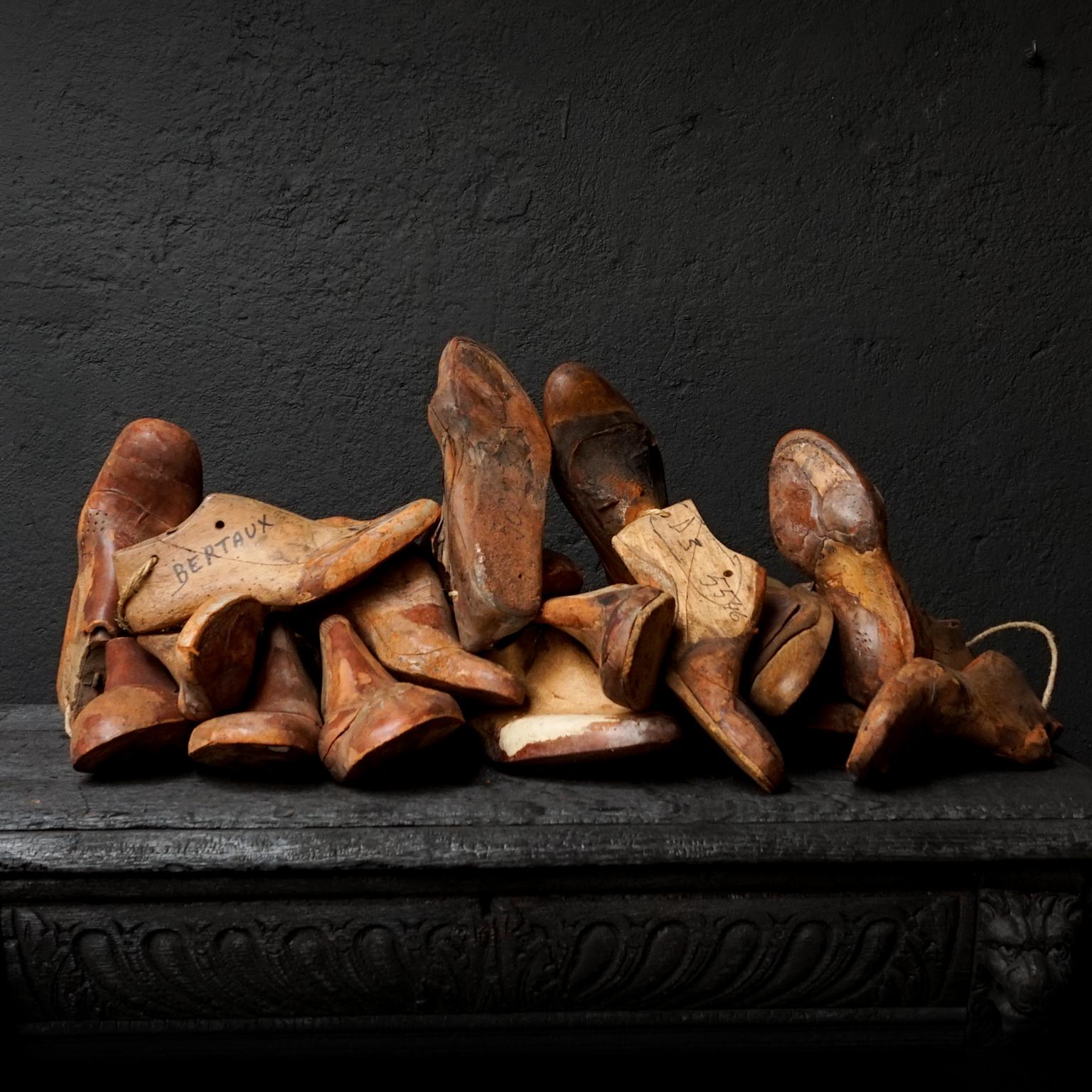 A little strange but very decorative set of 11 pairs of shoe lasts or wooden shoe moulds.
All pairs are orthopedic remodeled to fit various abnormalities on customers feet.

As you can see these lasts come in many styles and sizes.
Though the