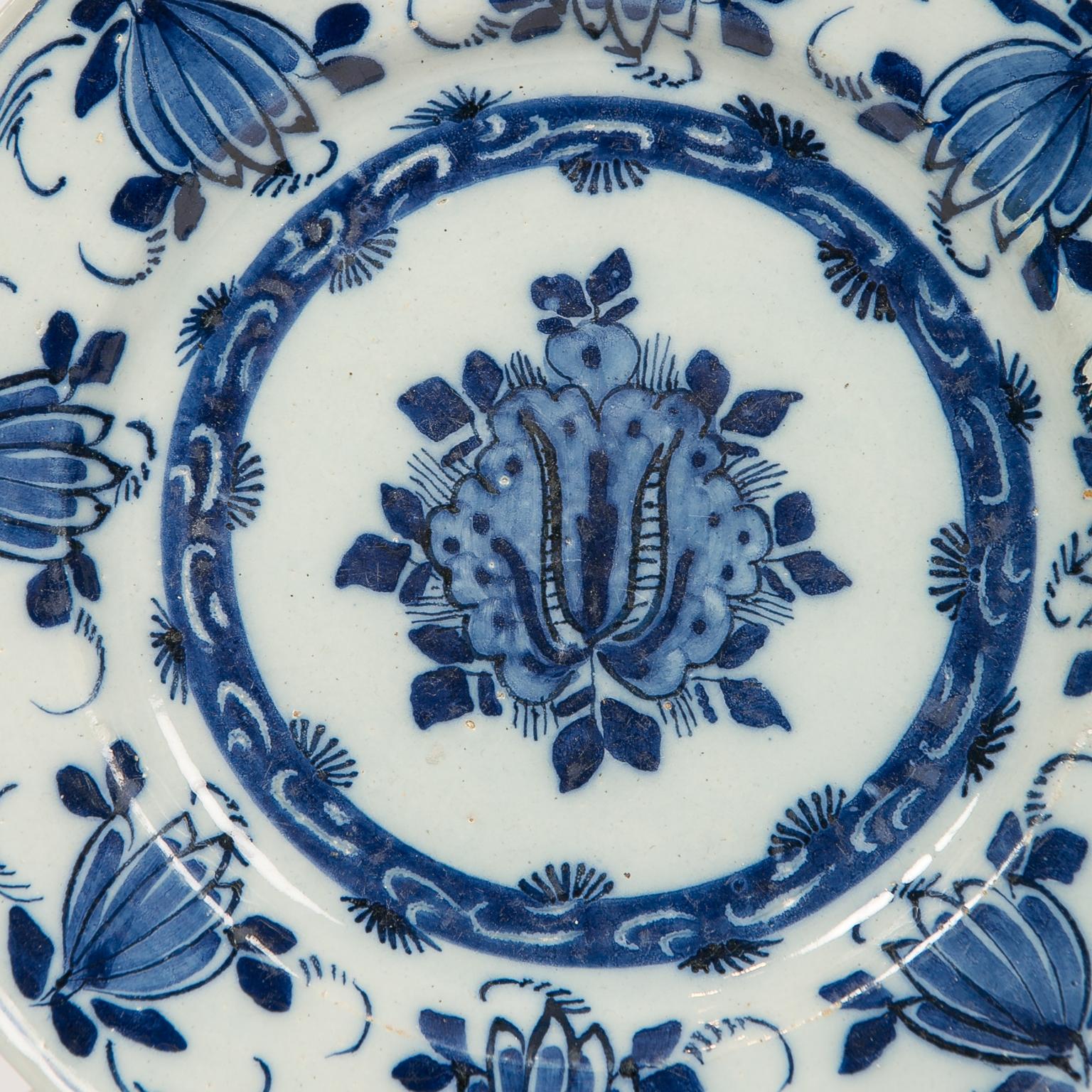 Rococo Eleven Hand-Painted Blue and White Delft Dishes 18th Century
