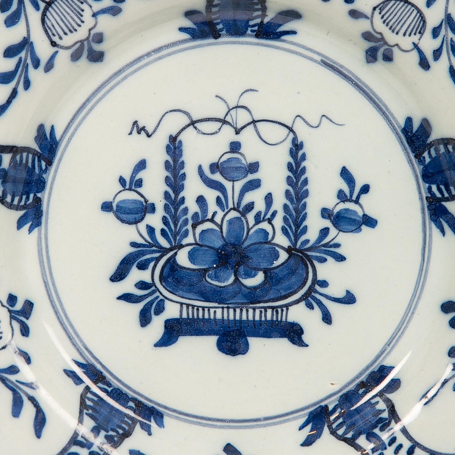 Eleven Hand-Painted Blue and White Delft Dishes 18th Century 4