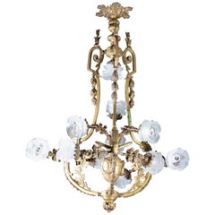 Lampada da soffitto a undici luci. Bronzo con finitura invecchiata.