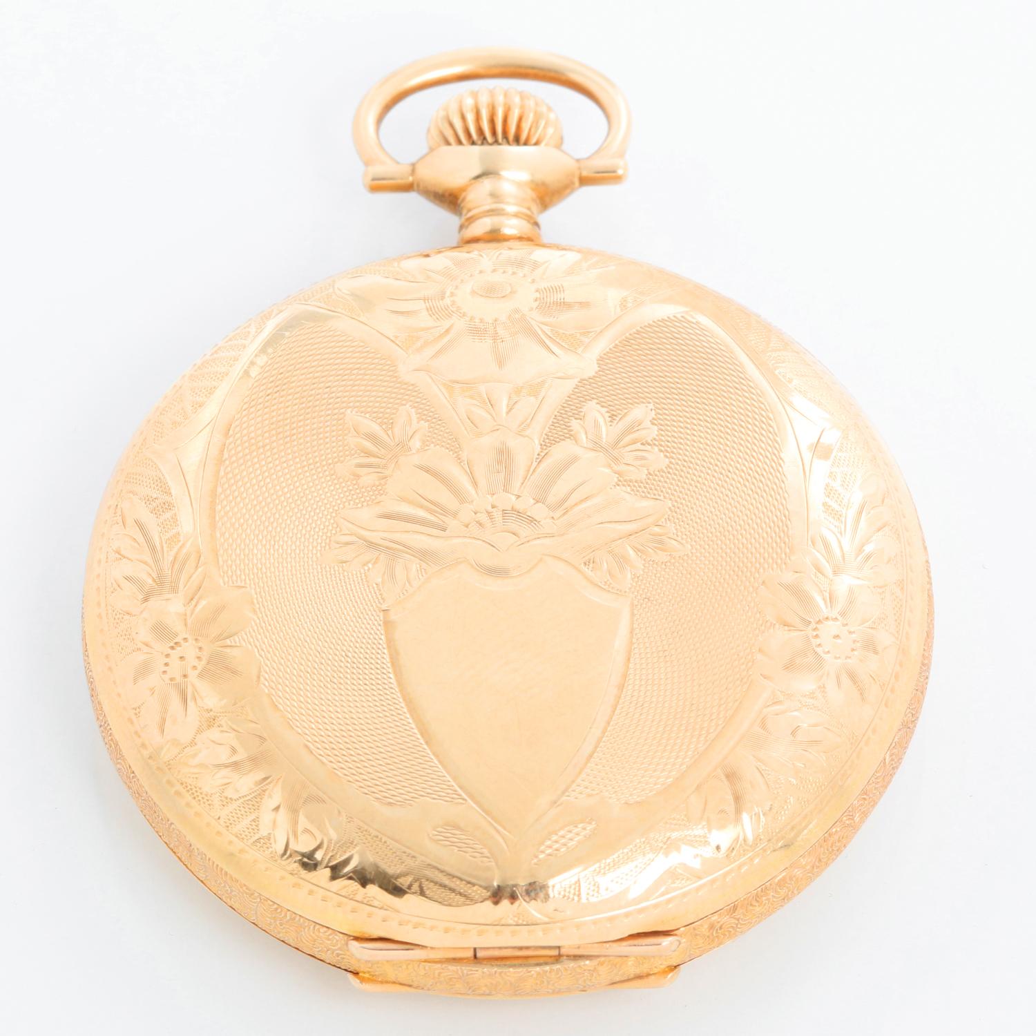 Elgin 14K Yellow Gold Pocket Watch - Manual winding. 14K Yellow gold with ornate case  ( 49 mm ). White dial with Arabic numerals. Pre-owned with custom box. 