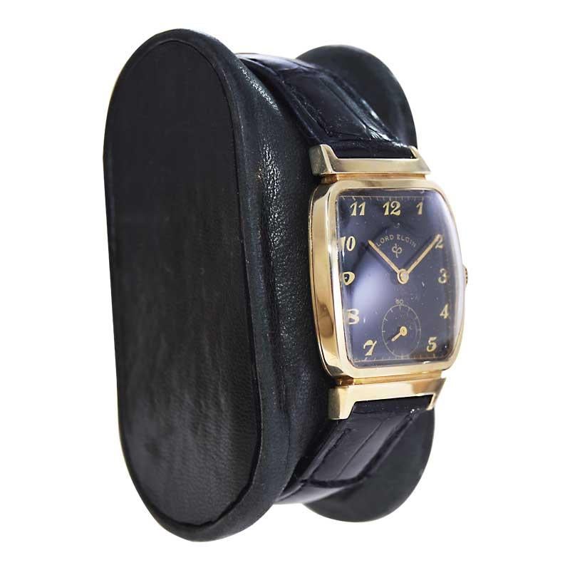 FACTORY / HOUSE: Elgin Watch Company
STYLE / REFERENCE: Tonneau Shape / Reference 4508
METAL / MATERIAL: 14Kt. Solid Gold 
CIRCA / YEAR: 1940's
DIMENSIONS / SIZE: 35mm X 24mm
MOVEMENT / CALIBER: Manual Winding / 21 Jewels 
DIAL / HANDS: Black with