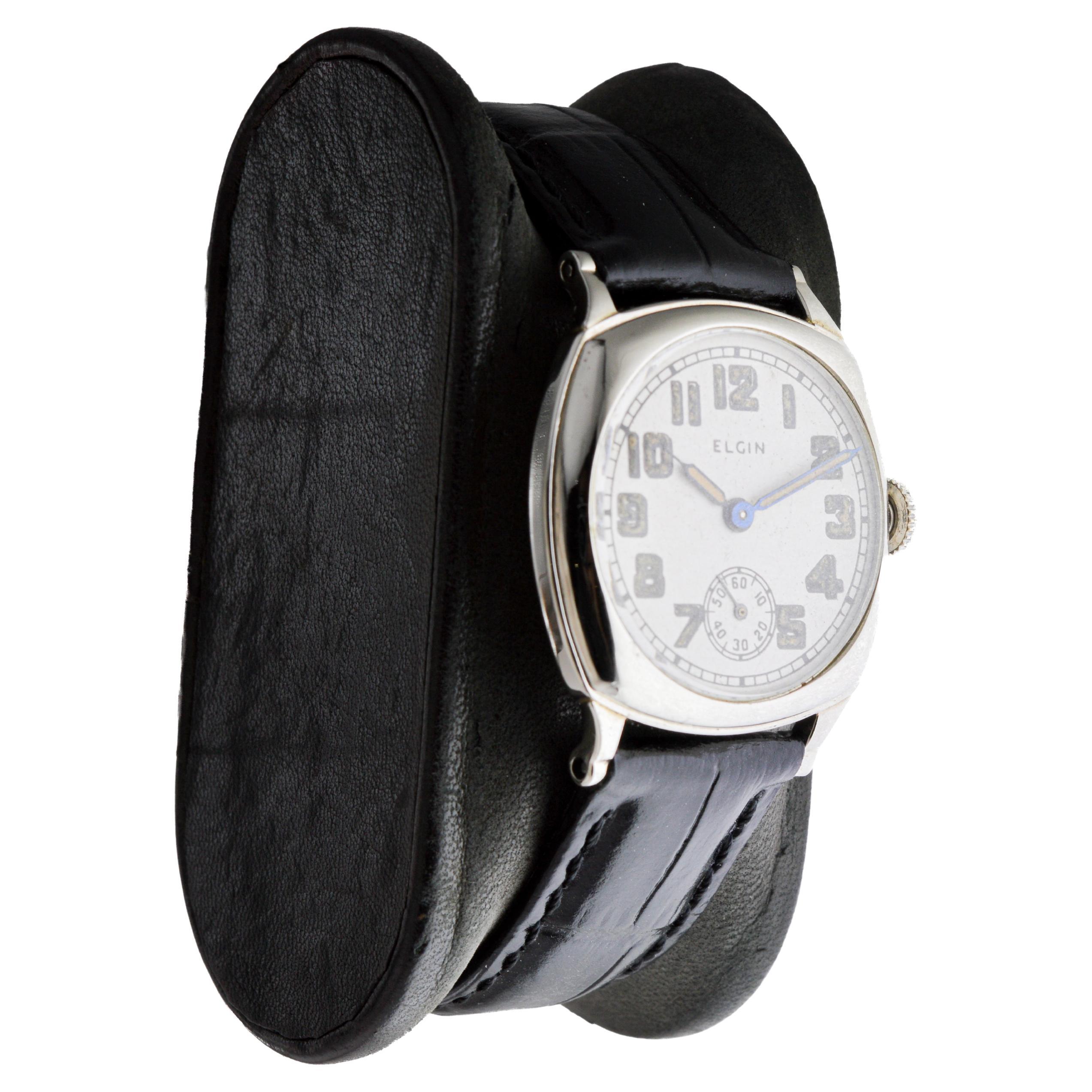 FACTORY / HOUSE: Elgin Watch Company
STYLE / REFERENCE: Art Deco / Cushion Shape
METAL / MATERIAL: 14Kt White Gold
CIRCA / YEAR: 1926
DIMENSIONS / SIZE: Length 34mm X Diameter 28mm
MOVEMENT / CALIBER: Manual Winding / 15 Jewels / Caliber 6-0