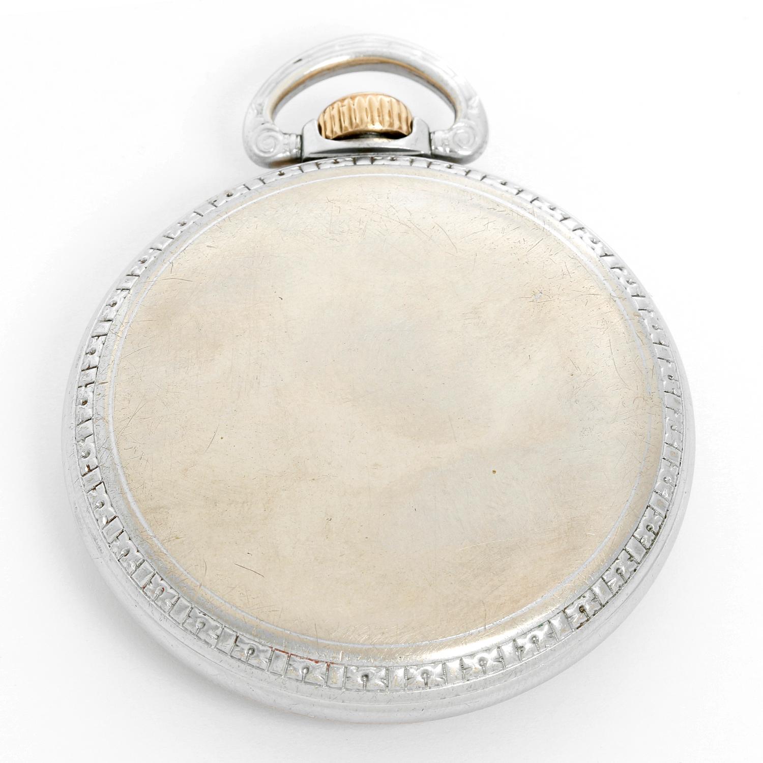Elgin  571 BW Pocket Watch - Manual; 21 jewels . Steel case ( 50 mm ). White enamel Elgin double sunk Montgomery dial, features ornate black Arabic hour numerals and block minute numerals. Pre-owned with custom box. 