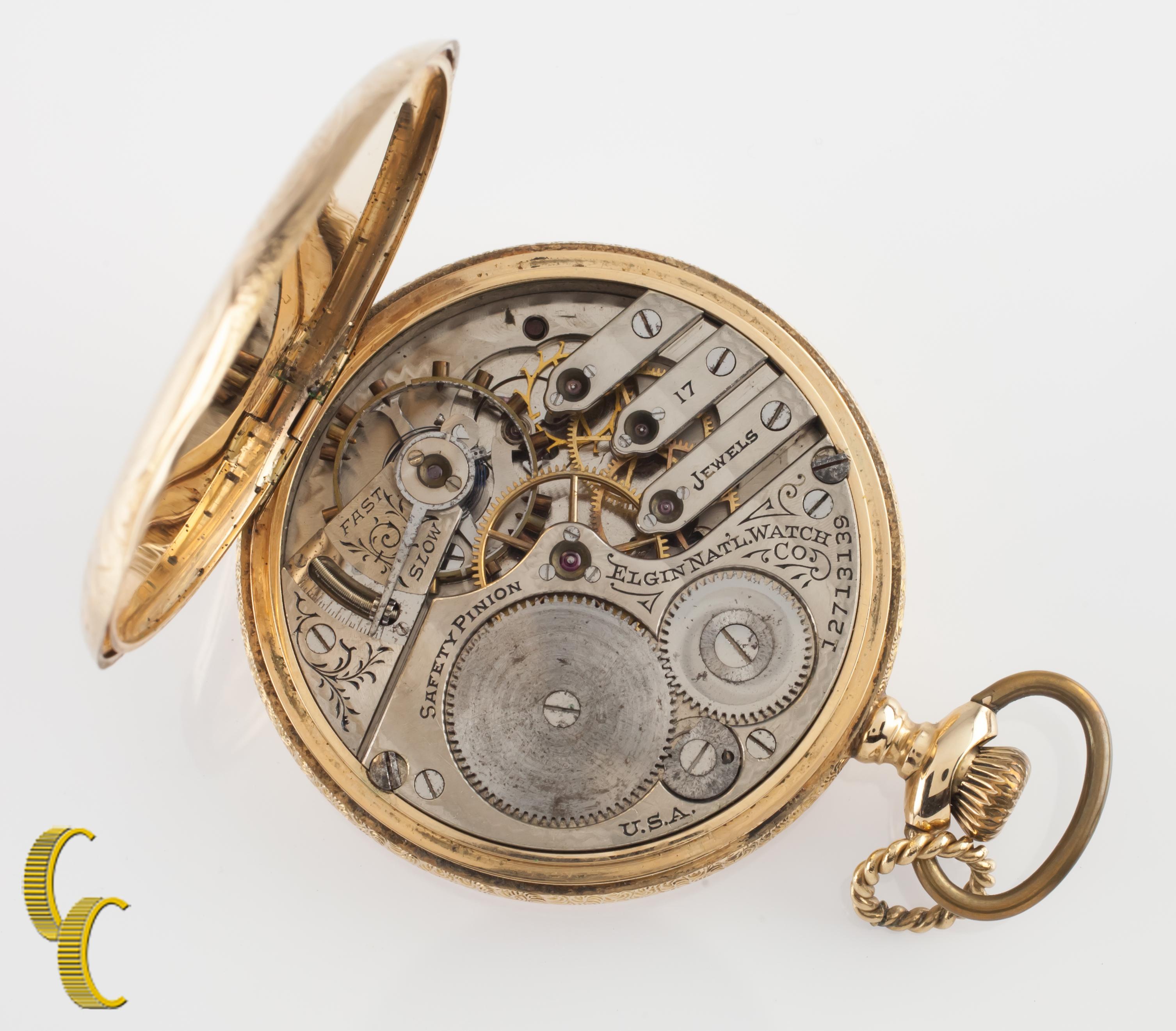 Beautiful Antique Elgin Pocket Watch w/ White Dial Including Blue Hands & Dedicated Second Dial
14K Yellow Gold Case w/ Intricate Hand-Etched Design on Case & Initials 