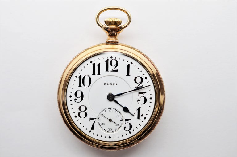 Elgin pocket watch store with train on back