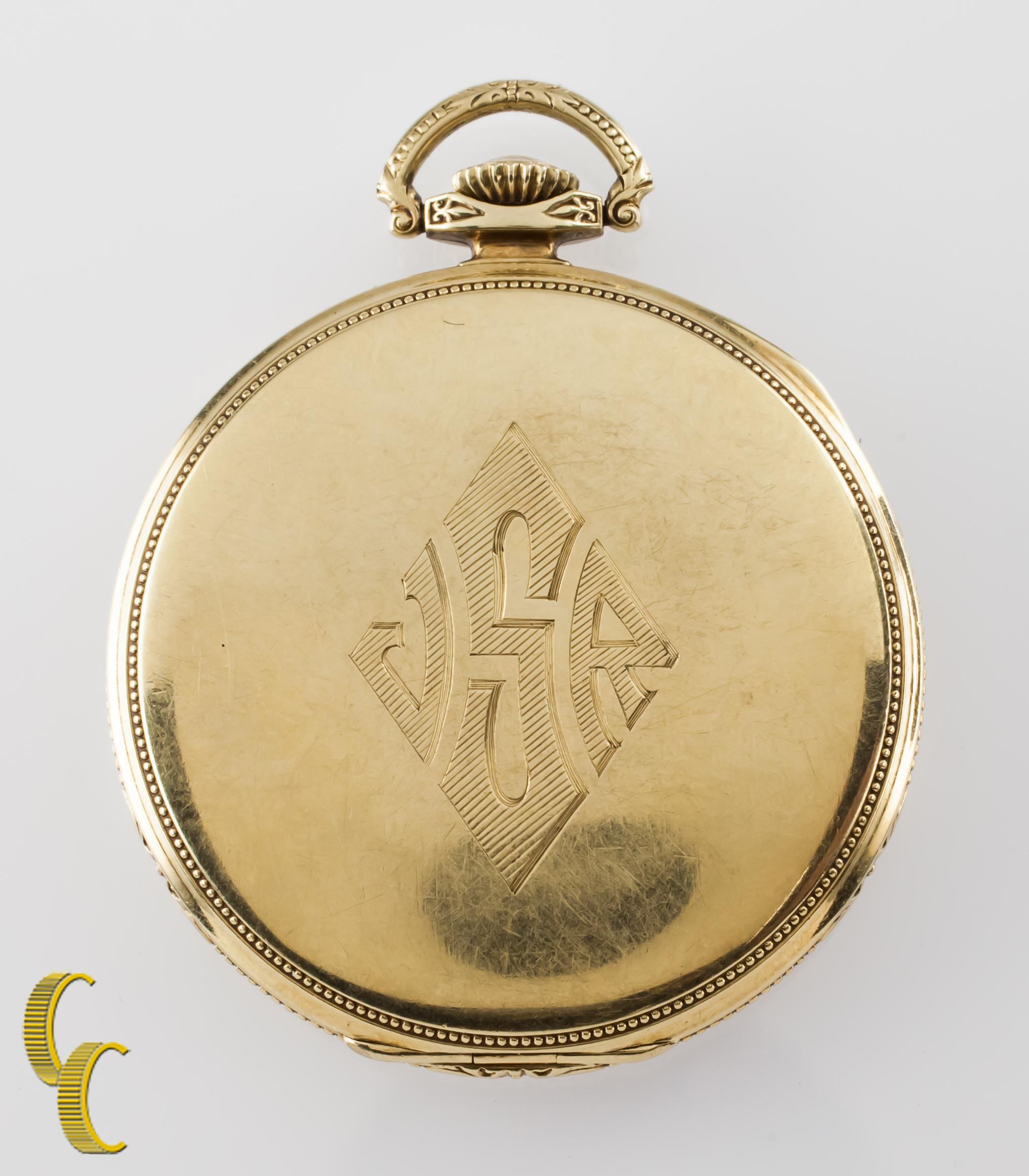 Beautiful Antique Elgin Pocket Watch w/ Champagne Dial Including Gold Hands & Dedicated Second Dial
14k Yellow Gold Case w/ Intricate Hand-Etched Design on Case. Reverse of Case is Monogrammed.
Gold Arabic Numerals
Case Serial #11887 74
17-Jewel