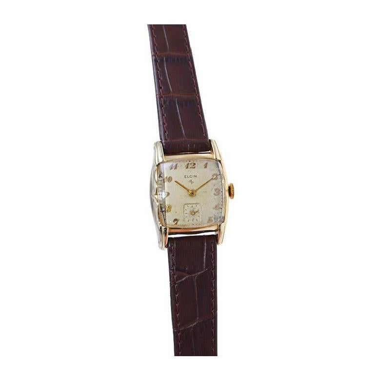 Women's or Men's Elgin Gold Filled Art Deco Tortue Shaped Wristwatch Original Design by Cartier For Sale