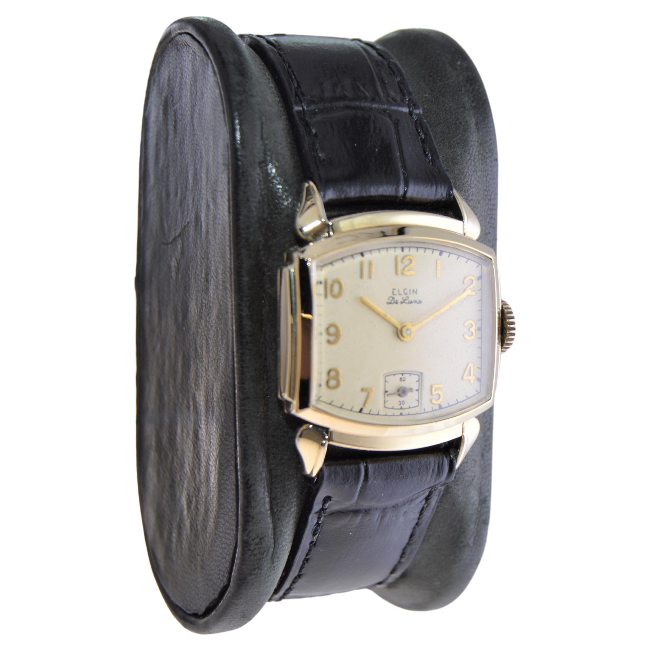 FACTORY / HOUSE: Elgin
STYLE / REFERENCE: Art Deco / Tortue Shape
METAL / MATERIAL: 14Kt. Yellow Gold Filled
CIRCA / YEAR: 1940's
DIMENSIONS / SIZE: 32mm Length X 25mm Width
MOVEMENT / CALIBER: Manual Winding / 17 Jewels  
DIAL / HANDS: Factory