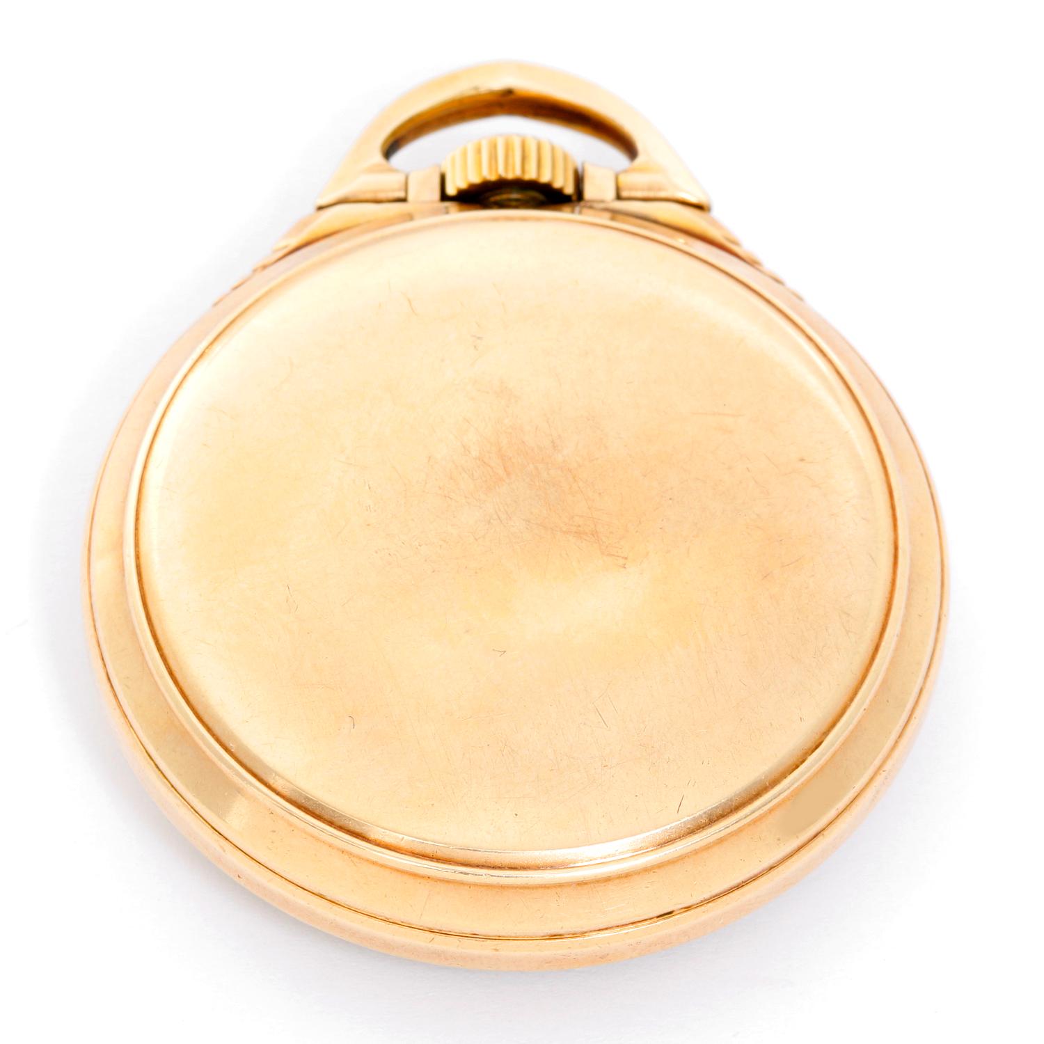 Elgin BW Raymond Pocket Watch - Manual winding; 21 jewels. Gold filled . White enamel single sunk dial with Arabic numerals . Pre-owned with custom box. Railroad approved. 