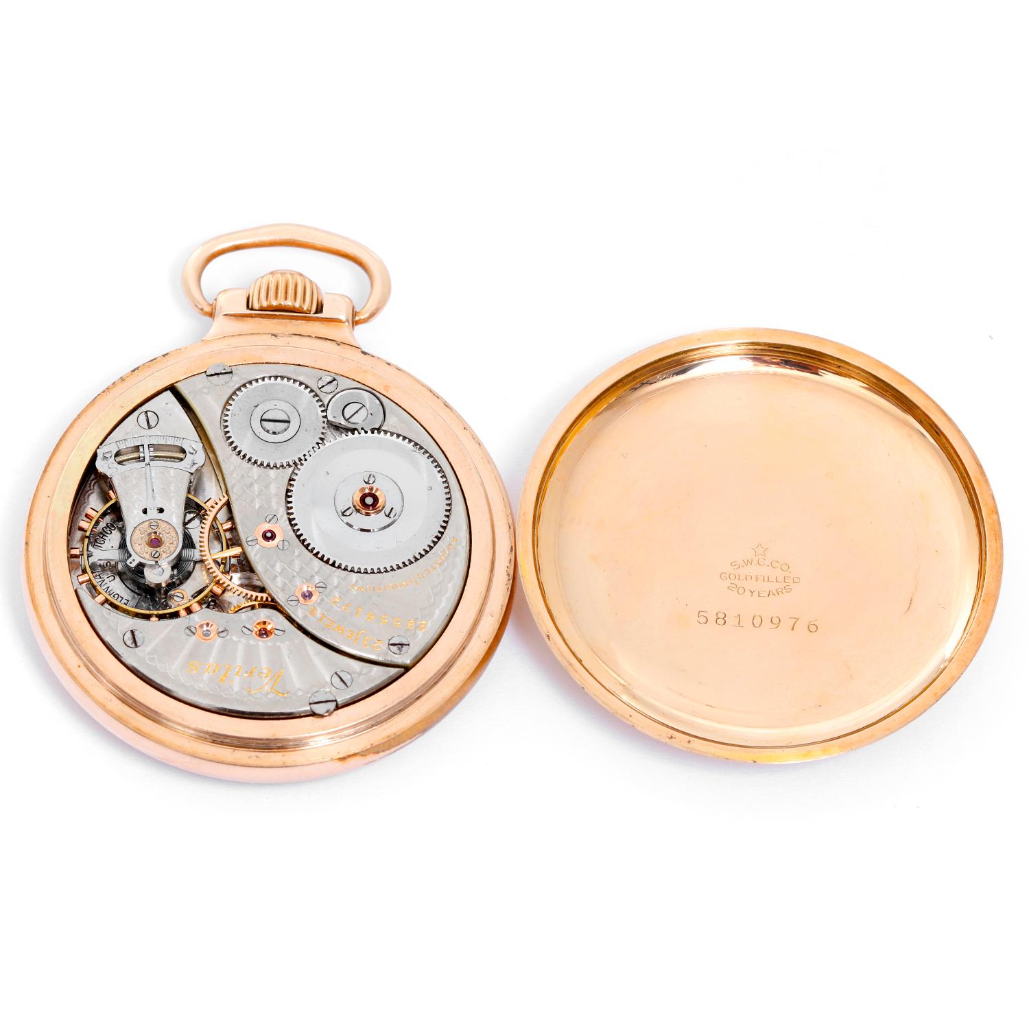 Elgin  Veritas Rail Road Pocket Watch - Manual winding; 23 Jewels . Gold filled with a R. R. case . Double sunk enamel dial with Arabic numerals . Pre-owned with custom box. Railroad approved. 