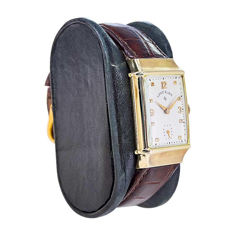 FACTORY / HOUSE: Elgin Watch Company
STYLE / REFERENCE: Art Deco Tank Style
METAL / MATERIAL: 14Kt. Solid Gold 
CIRCA / YEAR: 1944
DIMENSIONS / SIZE: Length 24mm X Width 37mm
MOVEMENT / CALIBER: Manual Winding / 21 Jewels / Caliber 559
DIAL / HANDS: