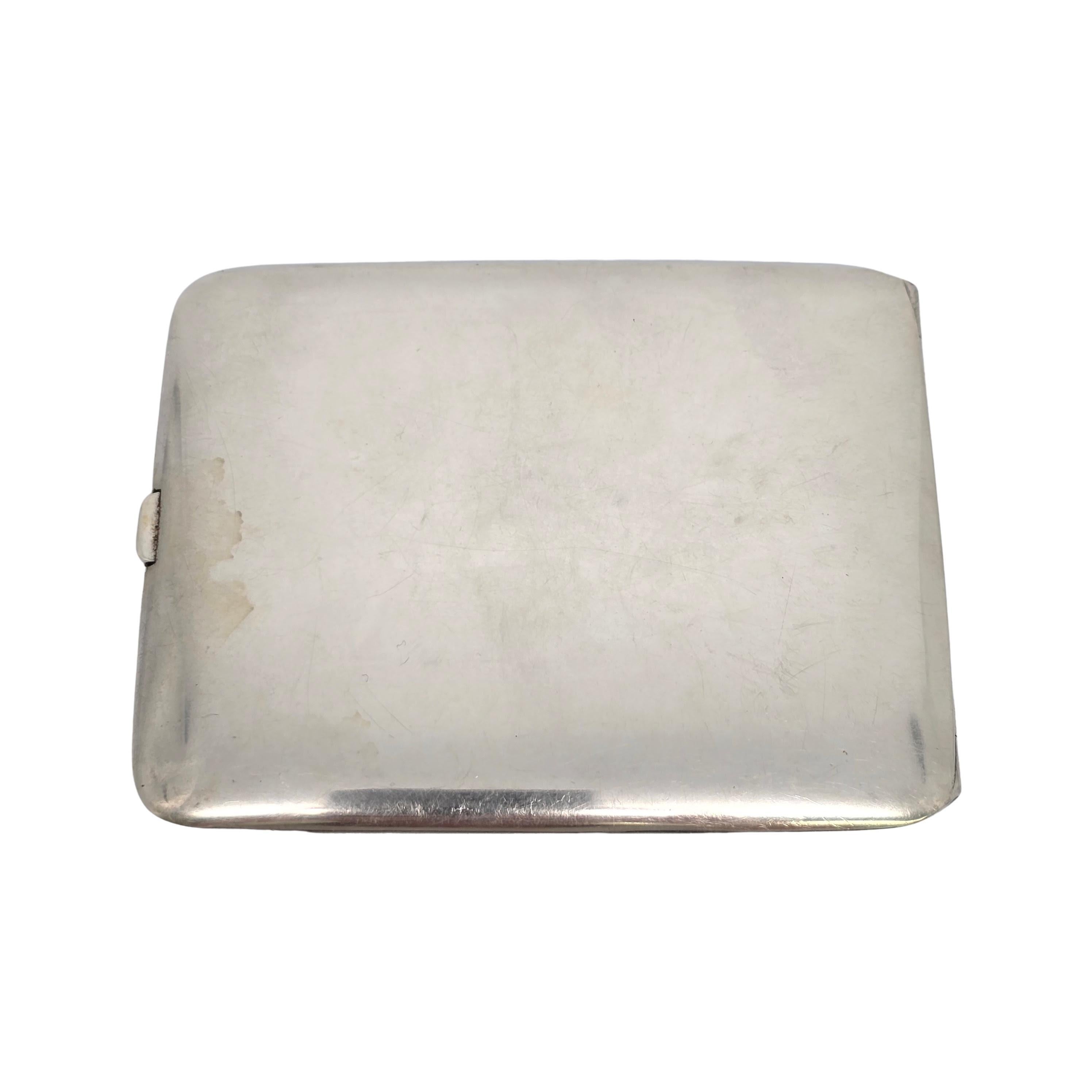 Sterling silver cigarette case by Elgin American Manufacturing Co, with monogram.

Monogram on the front appears to be AS. Monogram on the inside appears to be EF. 

Rectangular cigarette case featuring alternating etched stripes and a smooth