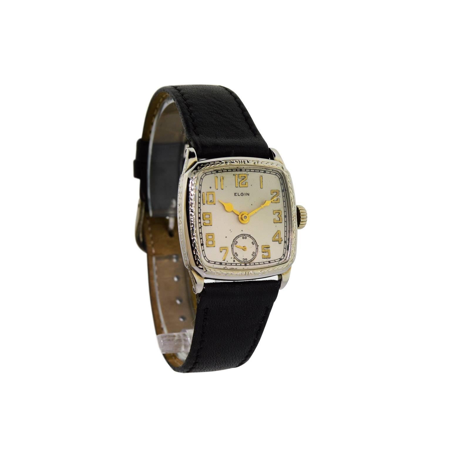 FACTORY / HOUSE: Elgin National Watch Company
STYLE / REFERENCE: Cushion Shaped / Engraved Bezel
METAL / MATERIAL: 14Kt. White Gold Filled 
CIRCA: 1929
DIMENSIONS: 37mm X 29mm
MOVEMENT / CALIBER: Manual Winding / 7 Jewels / Nickel Plates
DIAL /