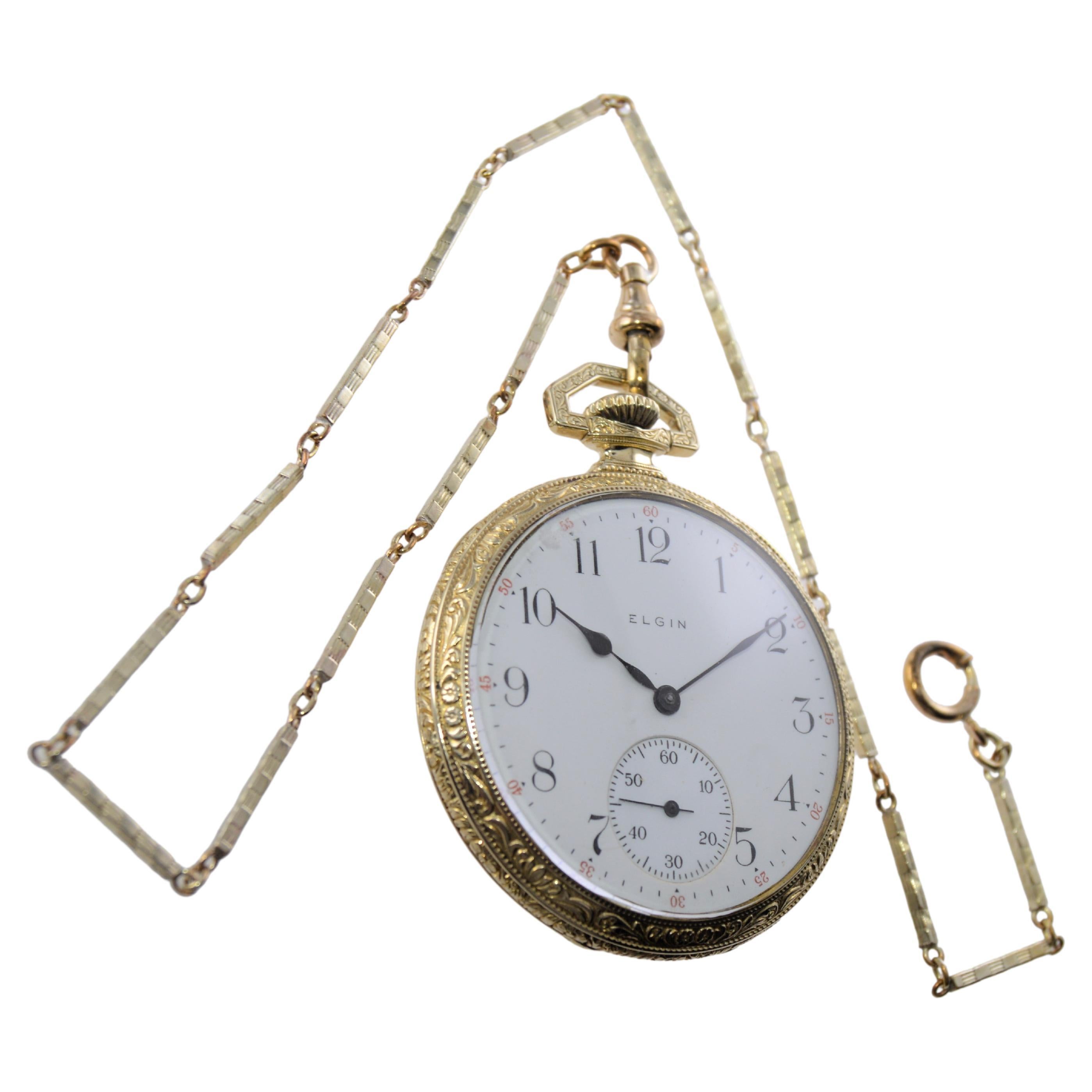 FACTORY / HOUSE: Elgin Watch Company
STYLE / REFERENCE: Round Open Face Pocket Watch
METAL / MATERIAL: Yellow Gold Filled 
CIRCA / YEAR: 1918
DIMENSIONS / SIZE: Length 43mm X Diameter 53mm
MOVEMENT / CALIBER: Manual Winding / 15 Jewels / 12