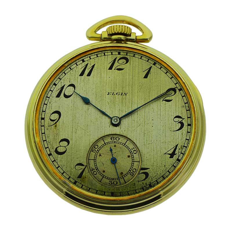 FACTORY / HOUSE: Elgin Watch Co.
STYLE / REFERENCE: Open Faced Pocket Watch
METAL / MATERIAL: Yellow Gold Filled
CIRCA / YEAR: 1911
DIMENSIONS / SIZE: Diameter 44mm
MOVEMENT / CALIBER: Manual Winding / 15 Jewels 
DIAL / HANDS: Original Silvered with