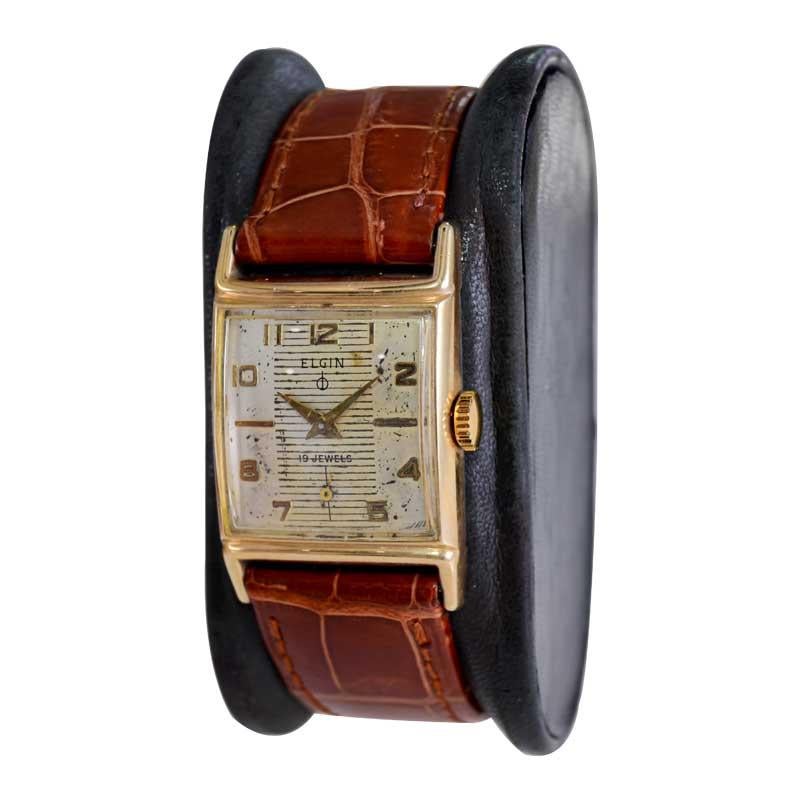 Women's or Men's Elgin Yellow Gold Filled Art Deco Tank Style with Original Patinated Dial 1950's For Sale