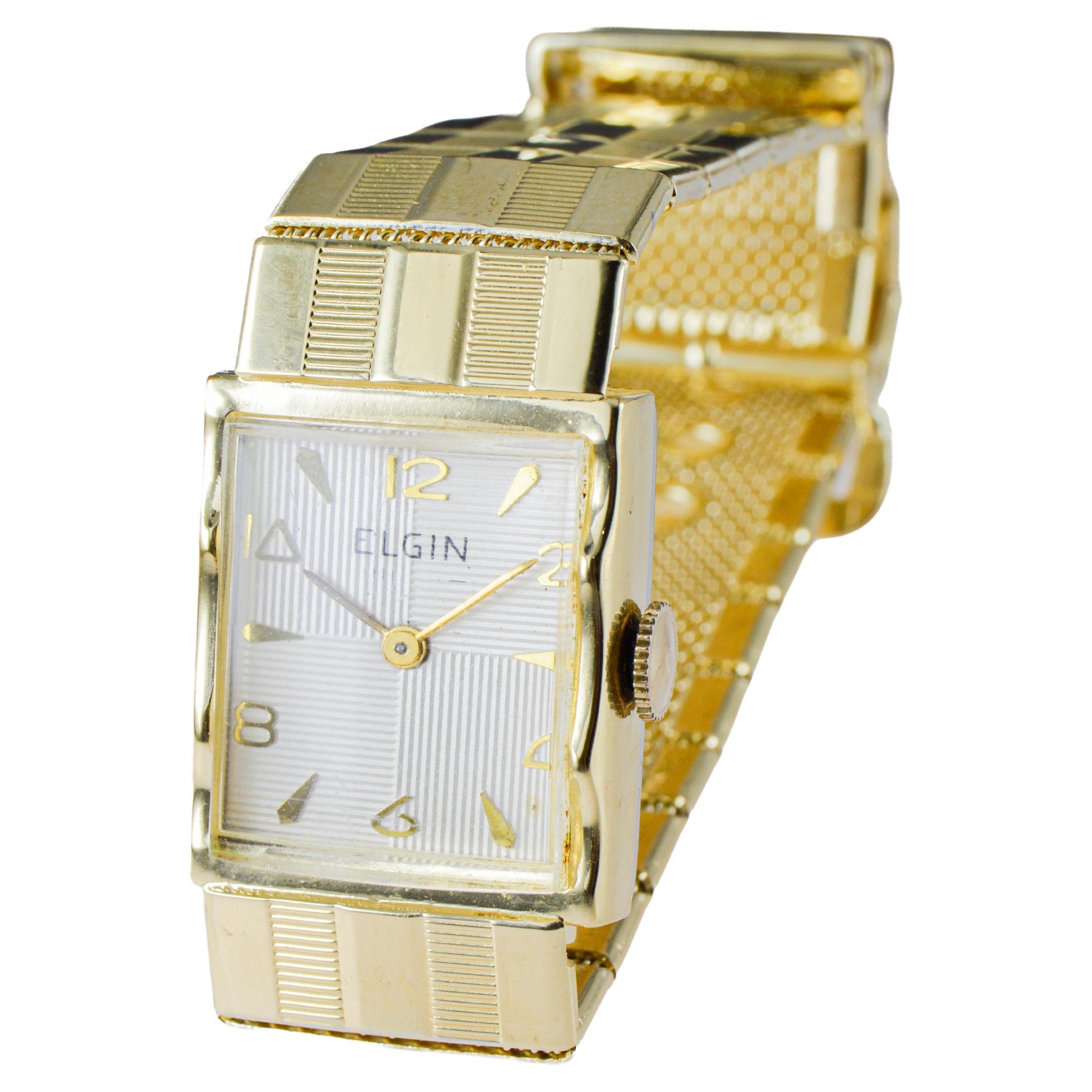 Reloj Art Déco Elgin de oro amarillo de los años 50 con esfera original en venta 7